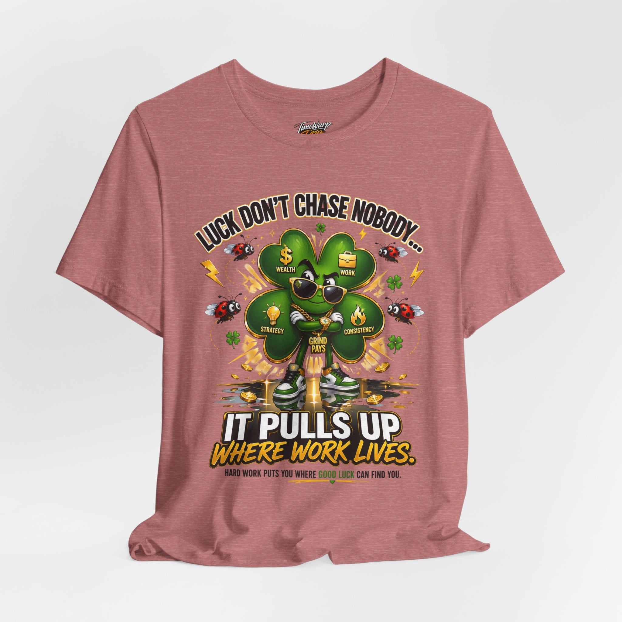 TimeWarp Drip Lucky Clover "Pulls Up Lives" pink streetwear tee rocks a bold shamrock. Hype style, confident drip. Sizes S–XL. streetwear apparel