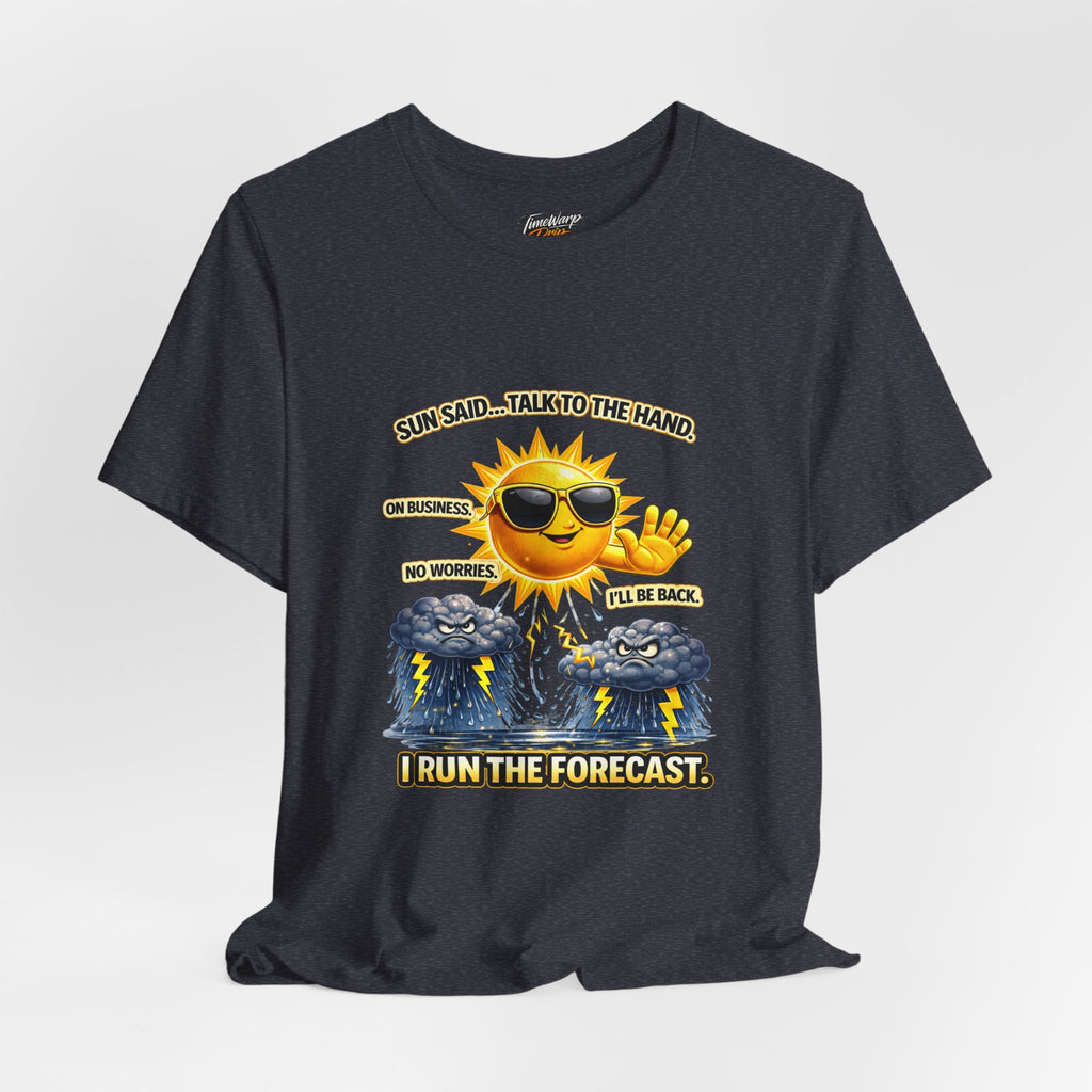The Calm Energy Vibes T-Shirt by Printify features a black, lightweight design with a cartoon sun sporting CEO Energy—sunglasses on, hand raised. Clouds and lightning beneath. Text: Sun said... talk to the hand. I run the forecast.