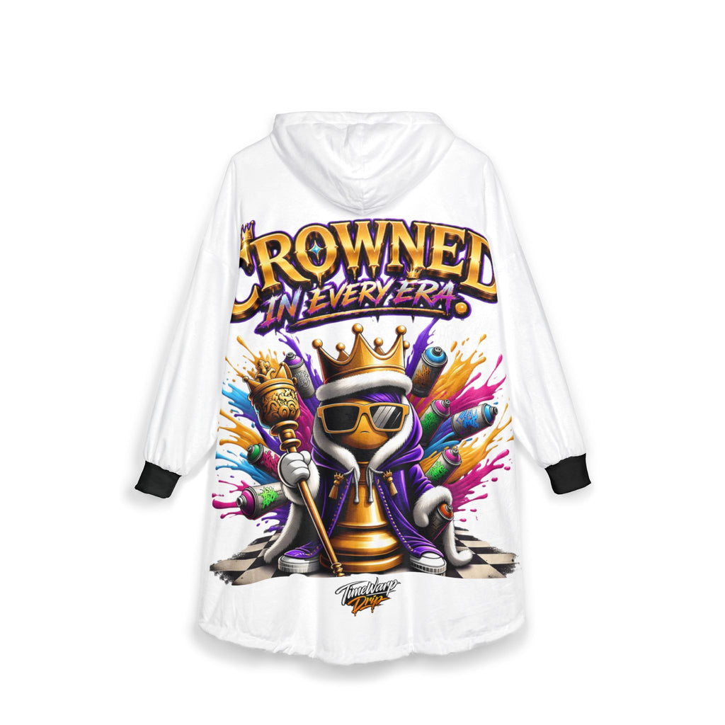 The "Crowned in Every Era" Royal Chess Graphic (White) Hooded Blanket features a one-size wrap with a graffiti-style crowned chess piece wearing sunglasses and holding a scepter, plus bold text above.