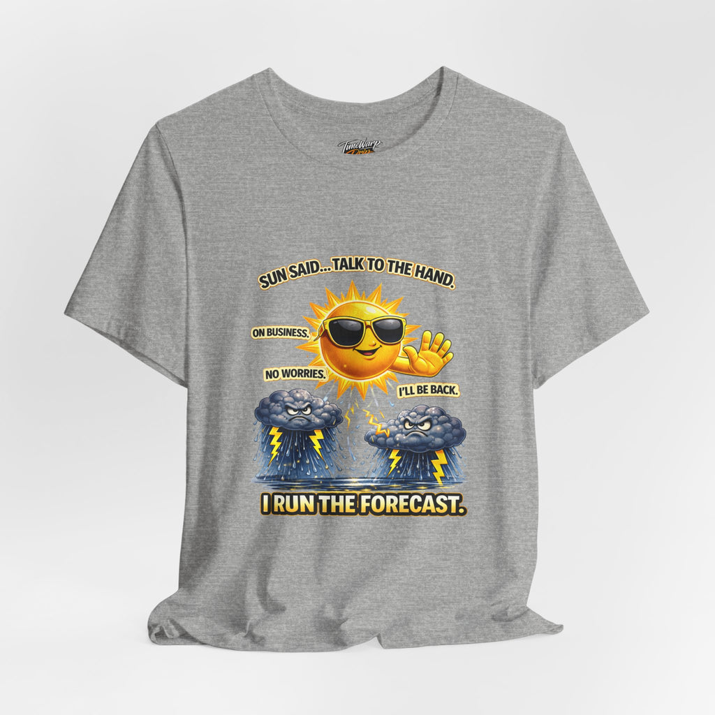 The Calm Energy Vibes T-Shirt by TimeWarp Drip features "I Run the Forecast" CEO Energy—a gray, lightweight Airlume cotton tee with a smiling sun in sunglasses surrounded by storm clouds, lightning bolts, and fun captions for a bold look.