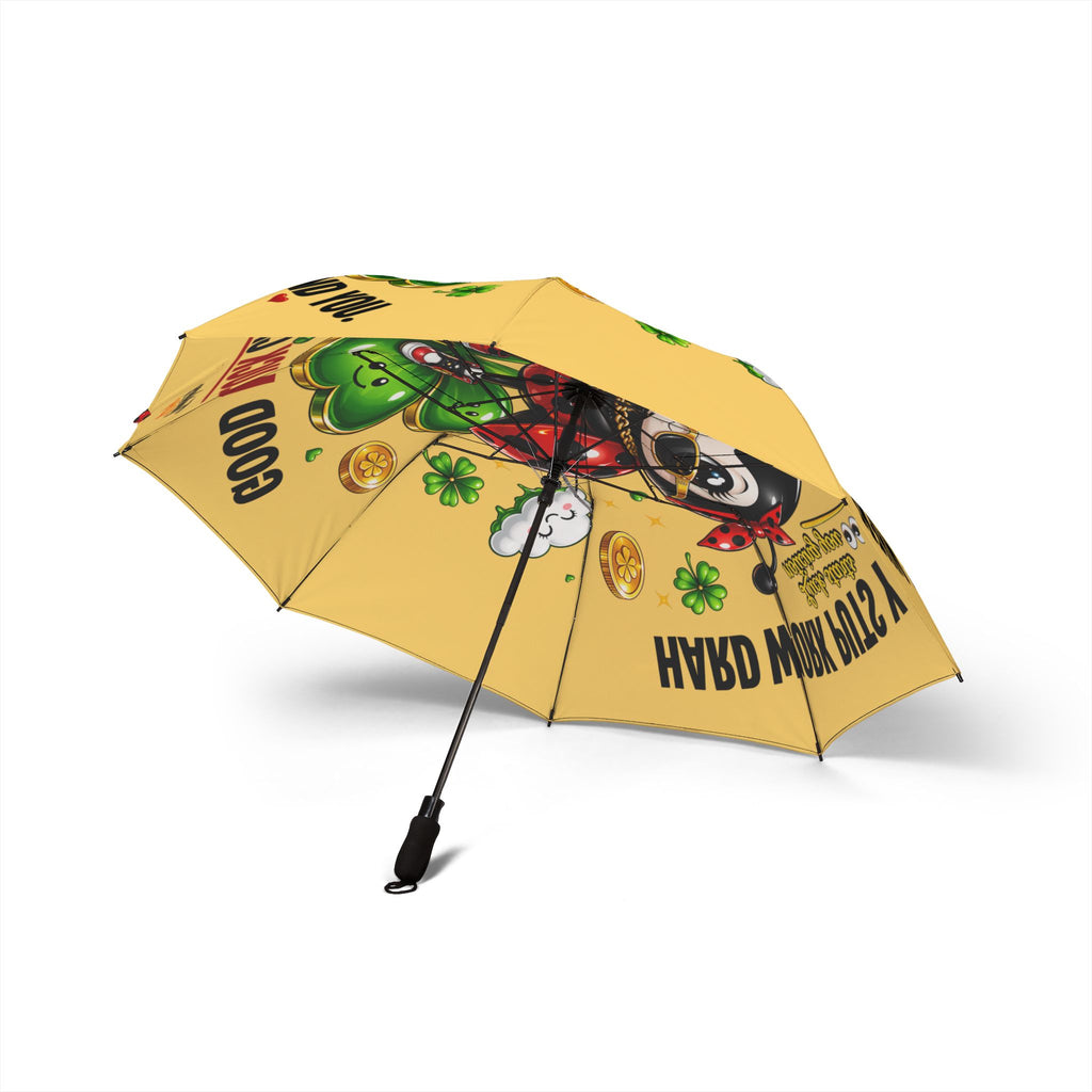 The Cute Lucky Ladybug Foldable (Yellow) Umbrella features cartoon graphics of a green four-leaf clover, gold coins, and bold text GOOD LUCK and YOU BRING MUCH LUCK on its roomy canopy, shown open against a white background.
