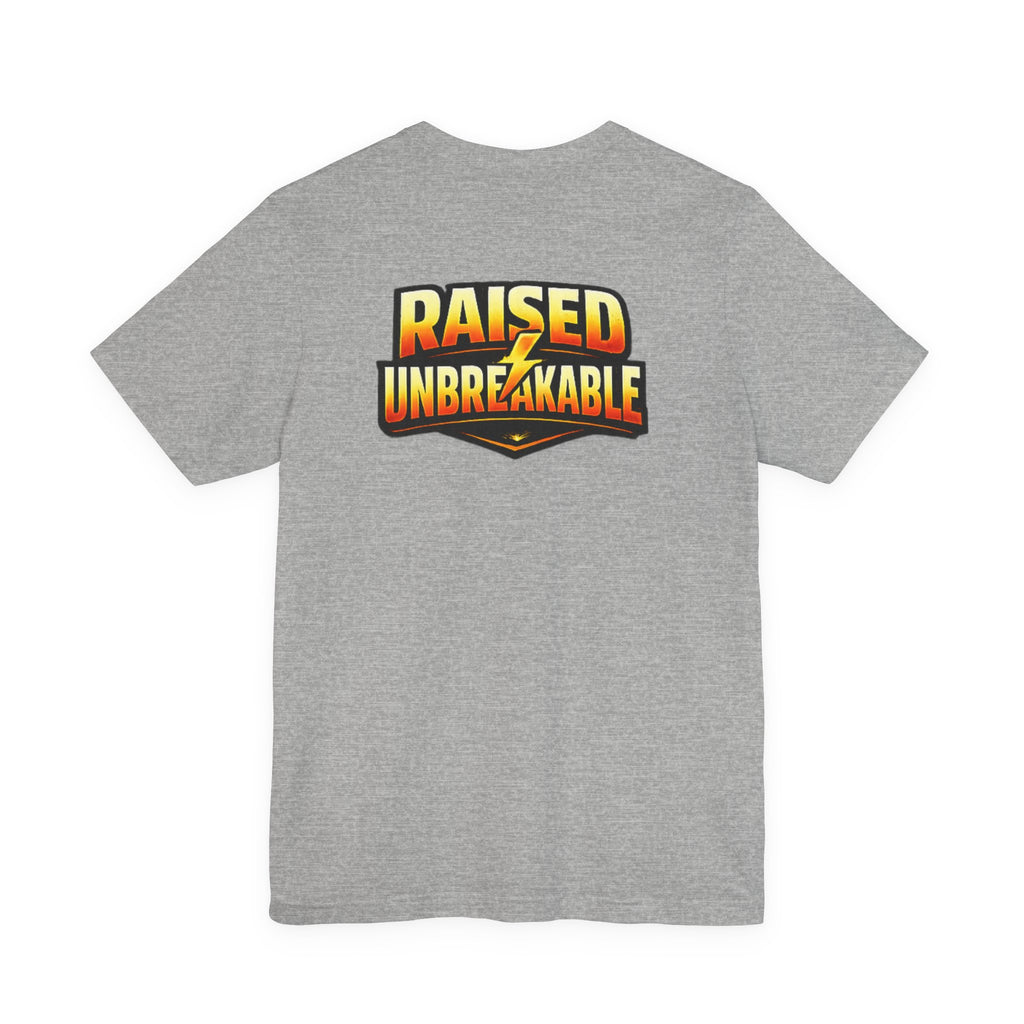 TimeWarp Drip Gray streetwear T-shirt by Printify, rocking bold yellow-orange “RAISED UNBREAKABLE” drip lettering on the back. streetwear apparel