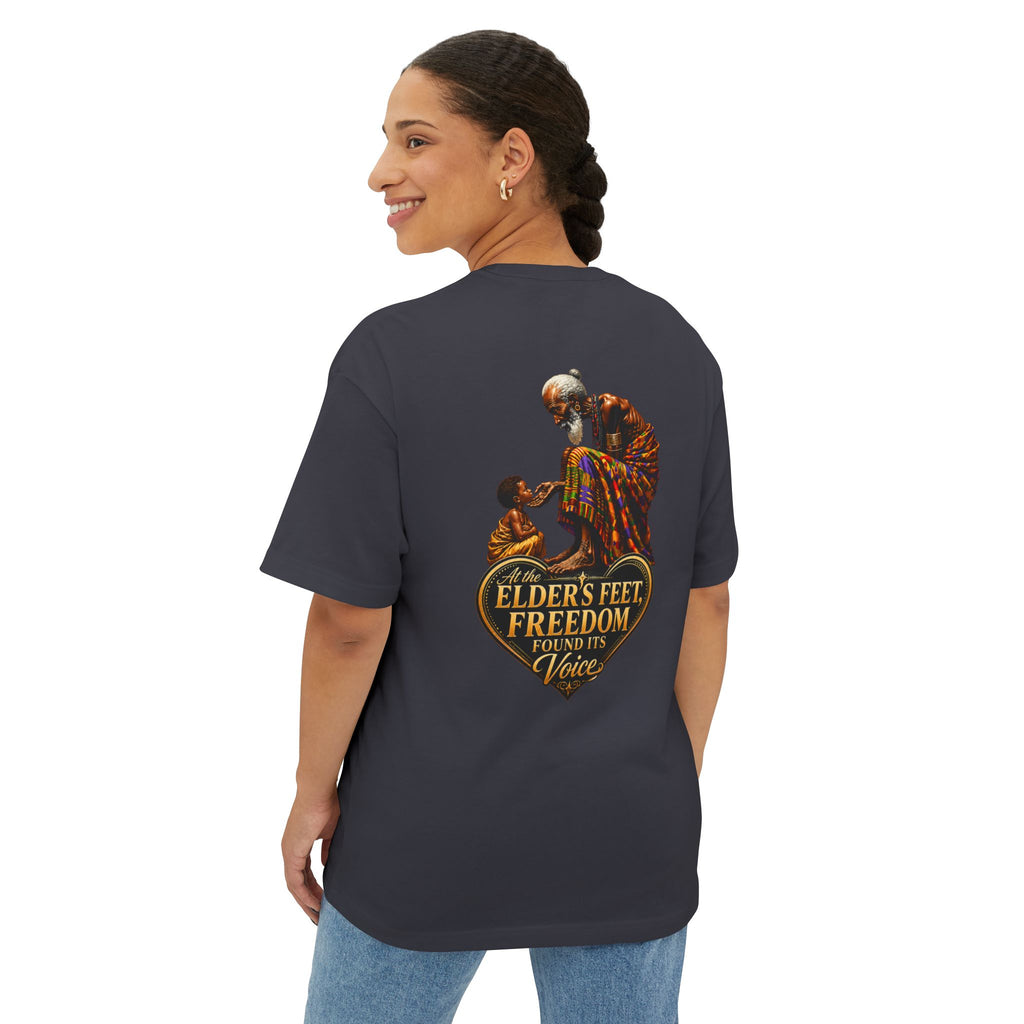 TimeWarp Drip – Black tee with bold “At the Elders Feet, Freedom Found Its Voice.” street statement on back, worn by confident woman. | premium streetwear
