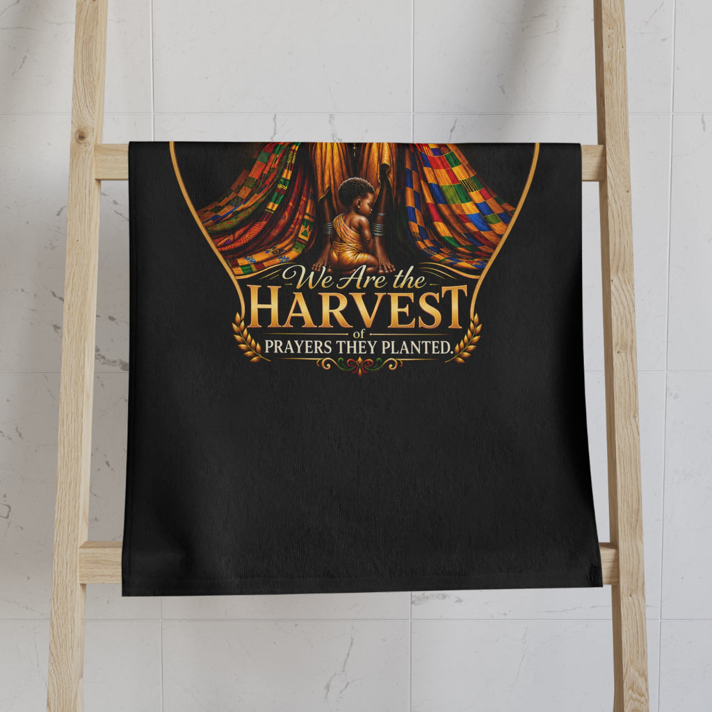 TimeWarp Drip – Black hand towel with bold "Rooted in Legacy" print, vibrant kente drape, and strong woman illustration—urban soul. | premium streetwear