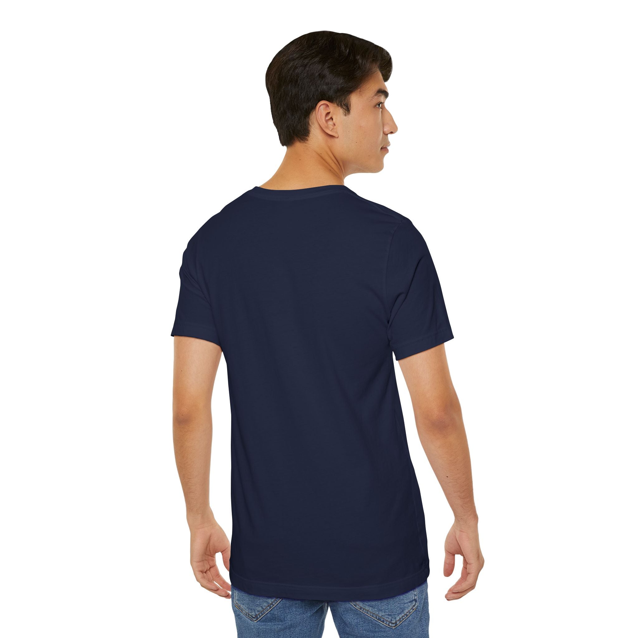 A person with short dark hair, wearing the Timewarp Drip Anti Social Wolf T-Shirt — a funny introvert graphic tee — and blue jeans, stands facing away from the camera, looking slightly to the side.