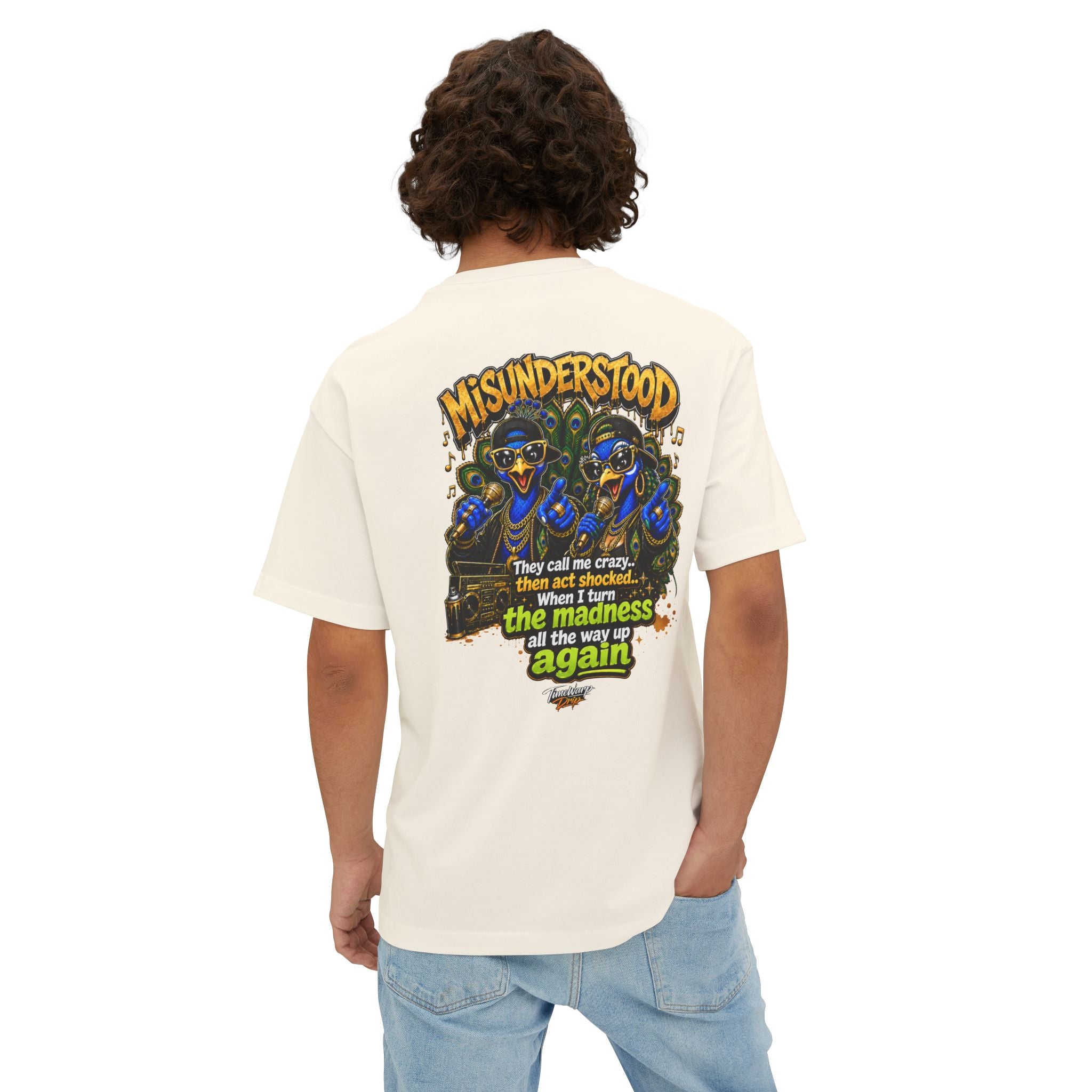 TimeWarp Drip – Oversized black boxy tee, bold “They Call Me Crazy I Call It Genius” print, dual peacock street art ignites the back. | premium streetwear