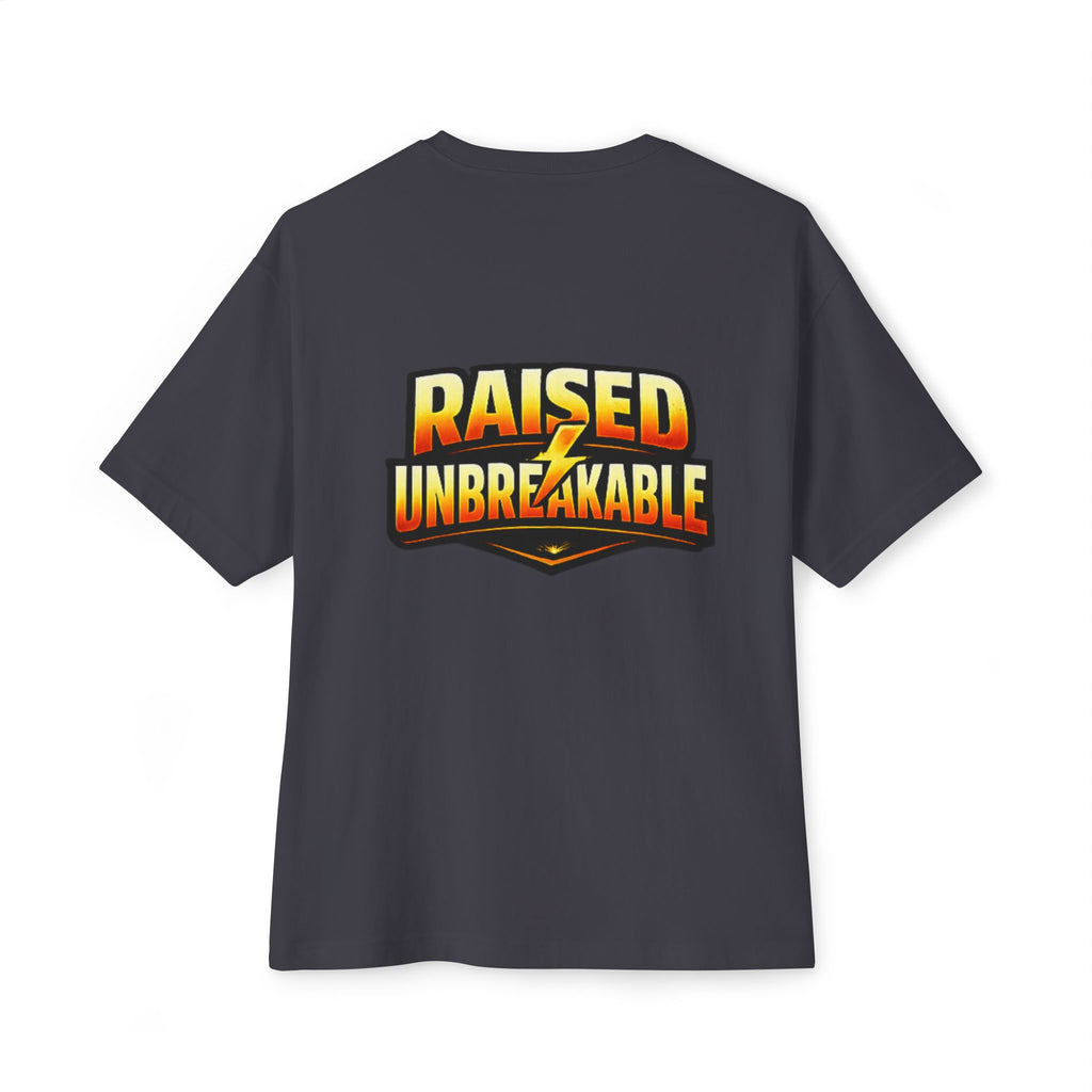 The Generation X Parenting "Come Get Em" Oversized Boxy T-Shirt by TimeWarp Drip is a dark gray cotton tee with bold yellow and orange “RAISED UNBREAKABLE” text and a lightning bolt on the back.