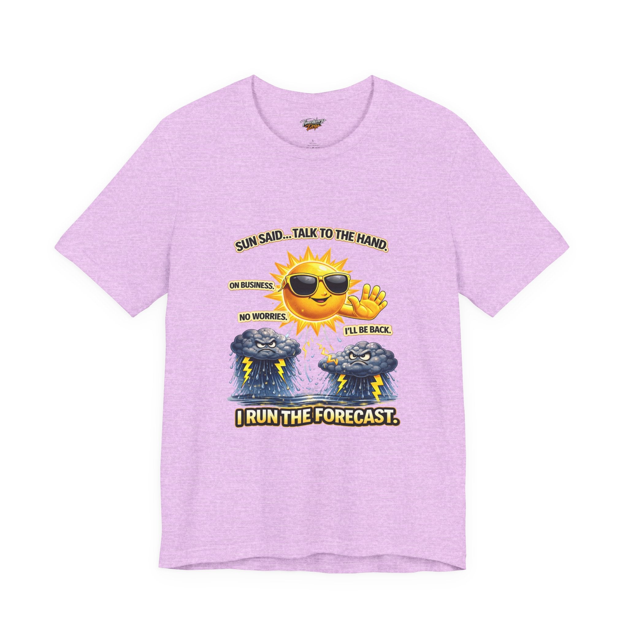 The Calm Energy Vibes T-Shirt by Printify features a light purple Airlume cotton tee with a cartoon sun in sunglasses waving above storm clouds and lightning, plus the text: “I Run the Forecast” CEO Energy.