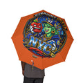 Orange NYC Night Out foldable umbrella by TimeWarp Drip, semi-automatic rain accessory with colorful cityscape design.