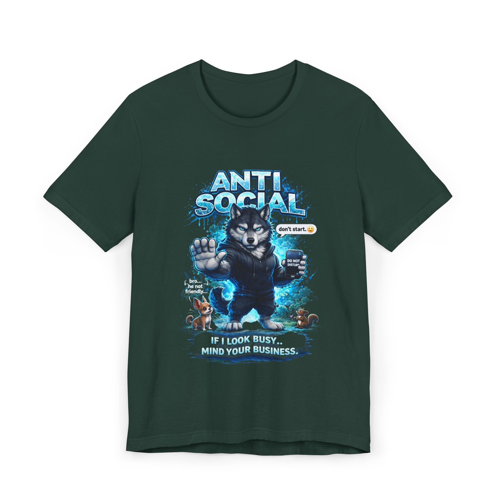 The Anti Social Wolf T-Shirt by Timewarp Drip is a dark green streetwear tee with a cartoon wolf in a hoodie, blue "ANTI SOCIAL" text, and the phrase "IF I LOOK BUSY… MIND YOUR BUSINESS." Blue graphics and small icons add extra attitude.