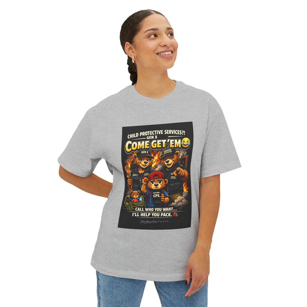A smiling person wears TimeWarp Drip's Generation X Parenting "Come Get Em" Tee—an oversized, boxy cotton shirt with a cartoon firefighter graphic and playful Gen X parenting humor text: "Child Protective Services?! Come Get Em.