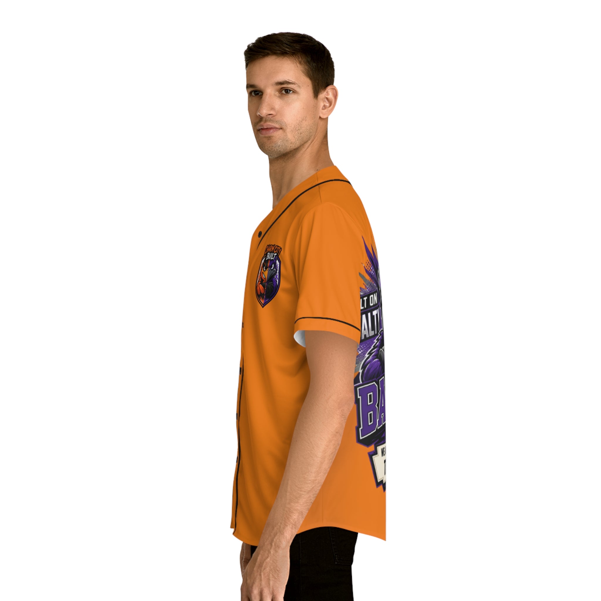 TimeWarp Drip – Orange baseball jersey with bold "Charm City Built" graphic, worn sideways for high-end city street style against white background. | premium streetwear