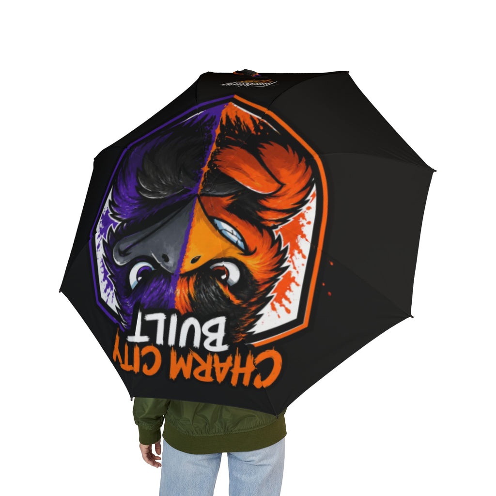 TimeWarp Drip Drip check: Rocking a foldable umbrella in bold Baltimore style, neon bird face pops on black—streetwear vibes on lock. 