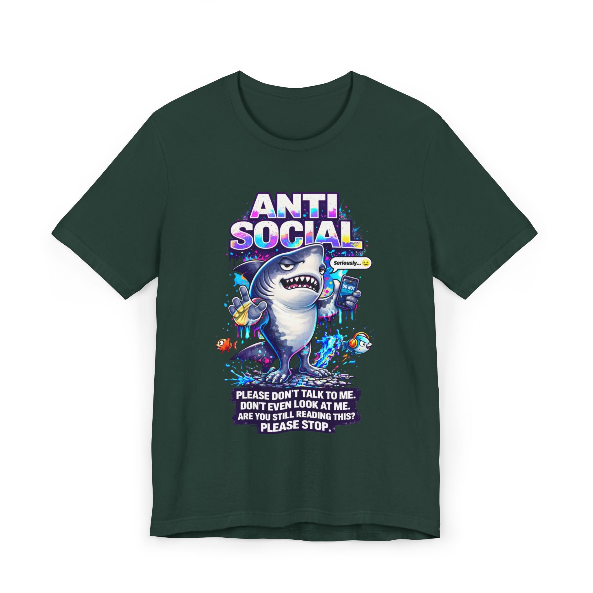 The Anti Social Shark T-Shirt — Funny Introvert Graphic Tee is a dark green unisex cotton shirt with a cartoon shark holding a phone and drink, surrounded by fish. Includes text: ANTI SOCIAL. Please don’t talk to me. Are you still reading this? Please stop.