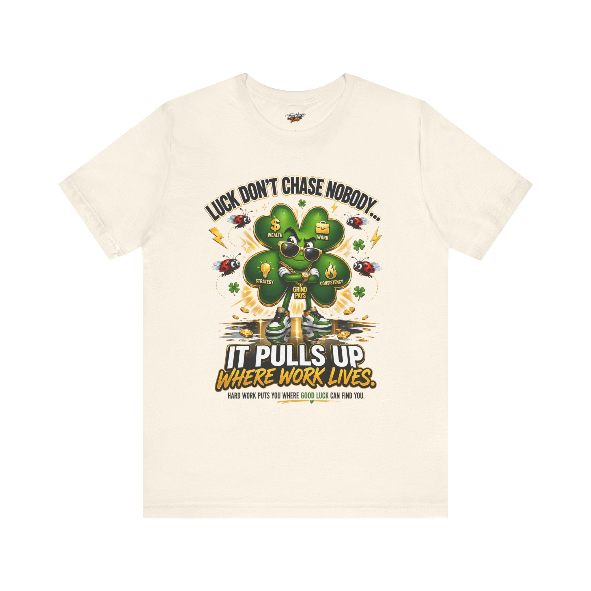 TimeWarp Drip Beige Airlume cotton tee—4-leaf clover pop, “Luck Don’t Chase Nobody” print. Streetwear drip with bold, lucky vibes. streetwear apparel