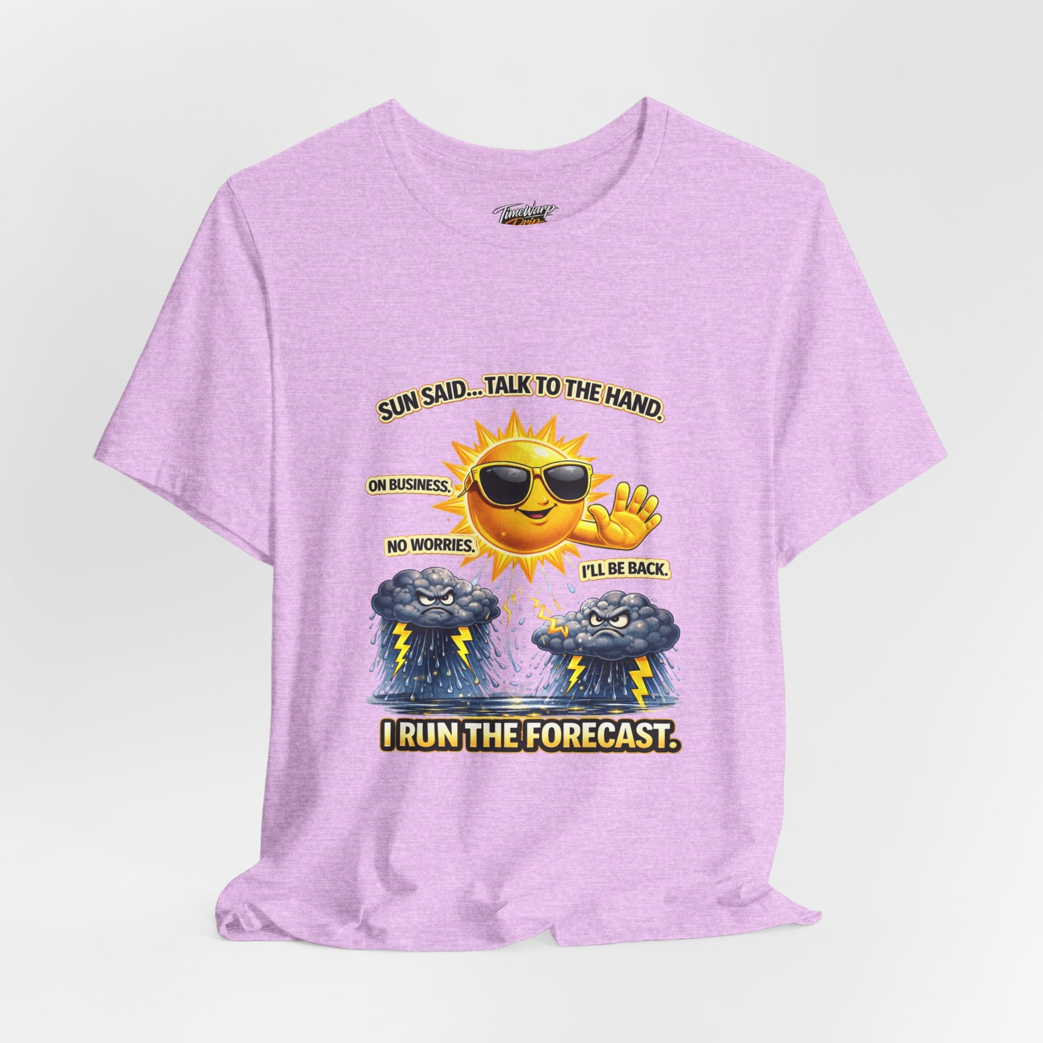 The Calm Energy Vibes T-Shirt — "I Run the Forecast" CEO Energy by TimeWarp Drip is a lightweight lavender tee with a sun in sunglasses saying, "I run the forecast," plus two storm clouds below. Made from soft Airlume cotton for all-day comfort!.
