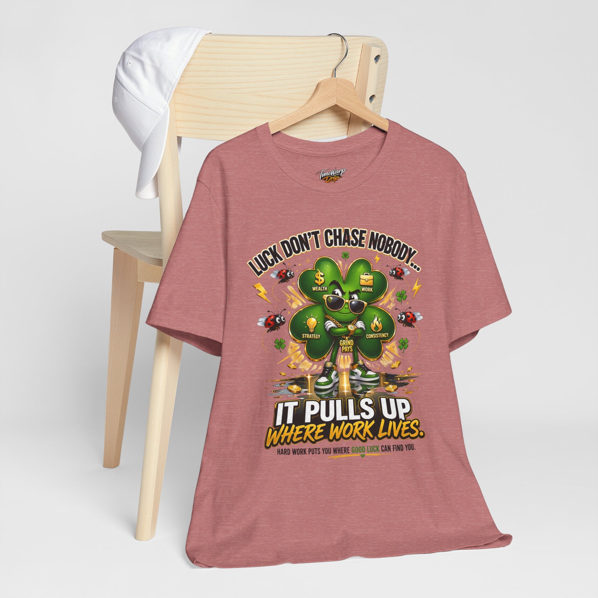 TimeWarp Drip Black 4-Leaf Clover street tee by Printify drips swag on a chair, crowned with a crisp white cap—luck in style, always. streetwear apparel