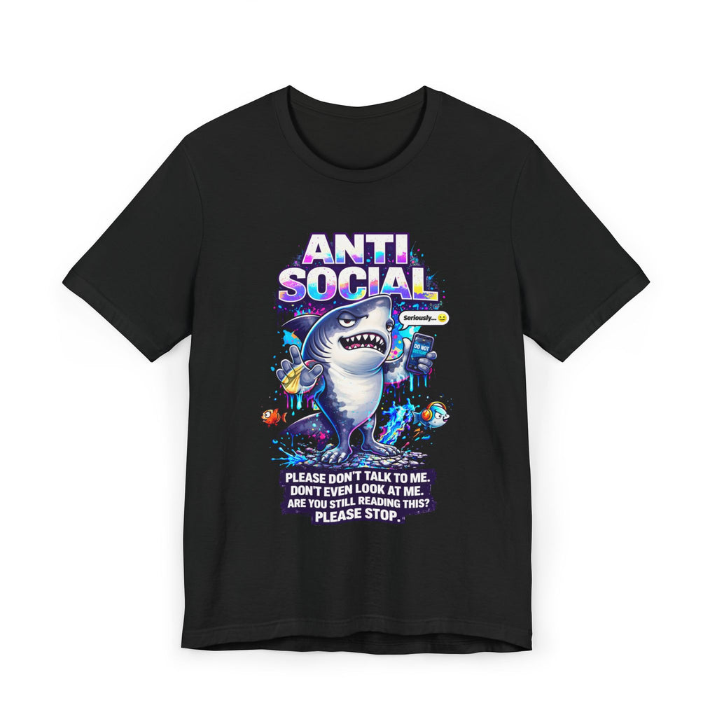 The Anti Social Shark T-Shirt — Funny Introvert Graphic Tee is a black unisex cotton tee with a cartoon shark holding a phone, surrounded by sea creatures. Features the text: ANTI SOCIAL. Please dont talk to me. Dont even look at me.