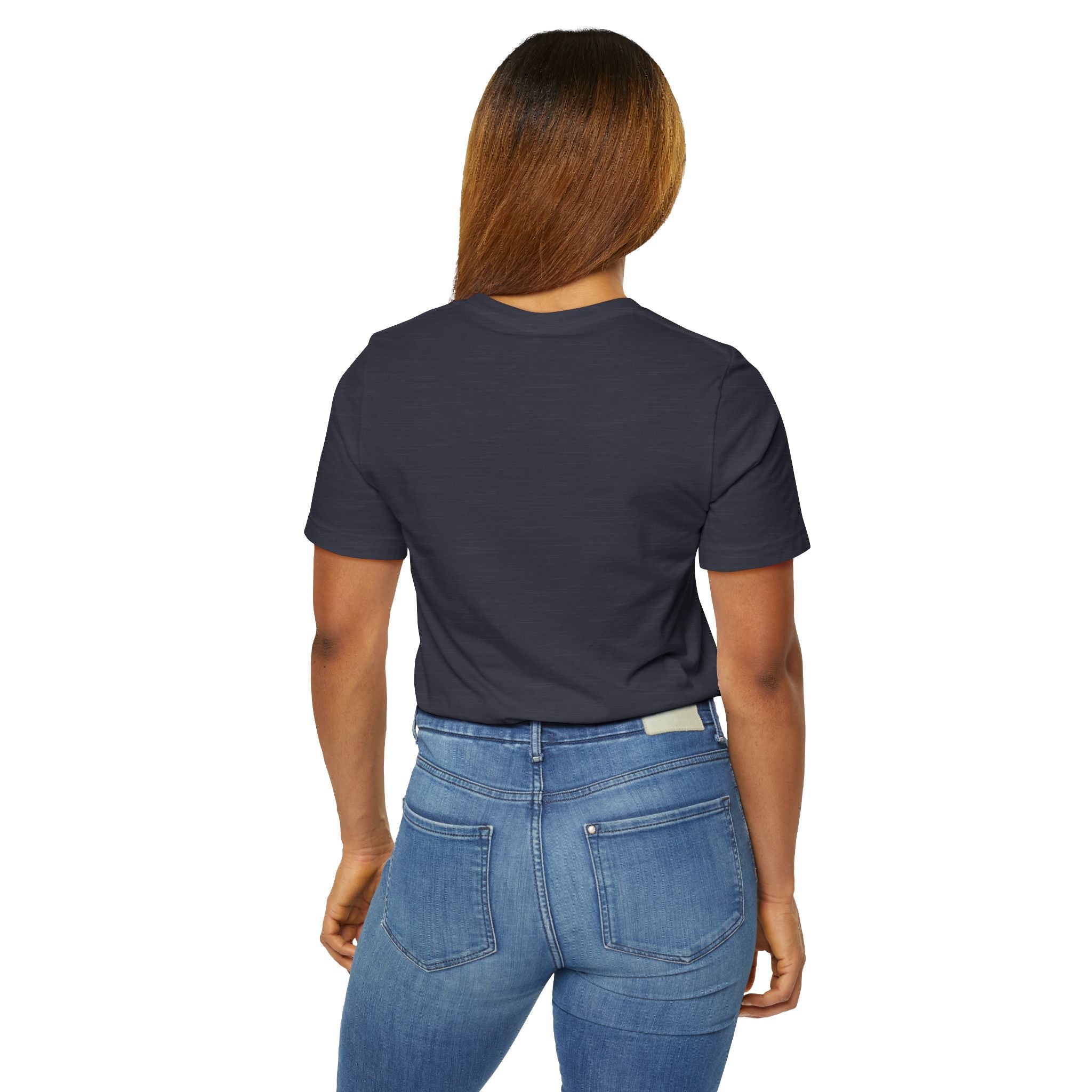 A woman stands with her back to the camera in blue jeans, wearing a dark TimeWarp Drip Anti Social Wolf T-Shirt — Funny Introvert Graphic Tee, against a plain white background.