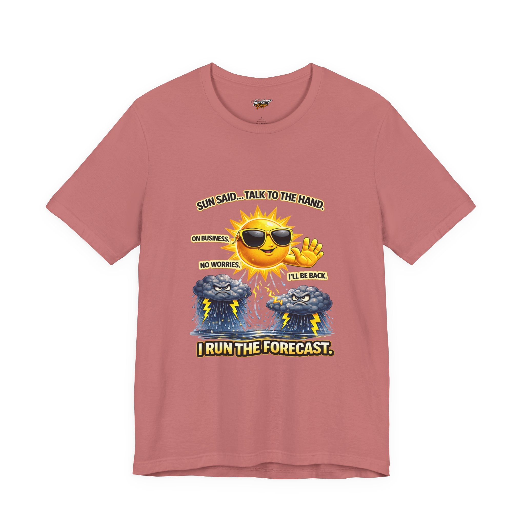 The Calm Energy Vibes T-Shirt — "I Run the Forecast" CEO Energy by Printify is a soft pink Airlume cotton tee with a cartoon sun in shades and CEO pose, storm clouds, and witty text: Sun said… talk to the hand. I run the forecast.