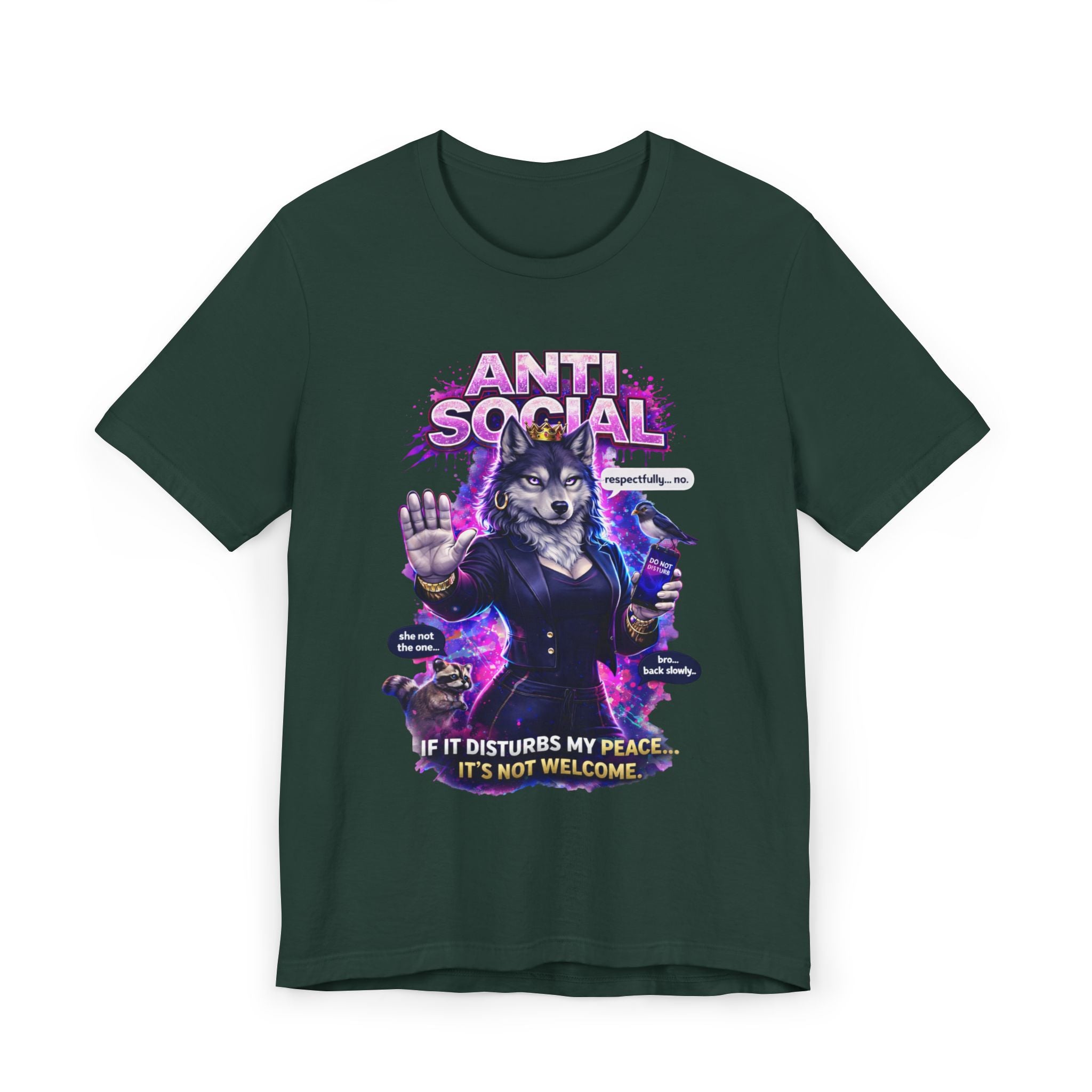 The Anti Social She-Wolf T-Shirt is a dark green graphic tee with an illustrated she-wolf in a suit making a stop gesture, bold pink "ANTI SOCIAL" text above, and speech bubbles: “Oh not you again,” “Respectfully… no,” and “Just, kindly, go away.”.