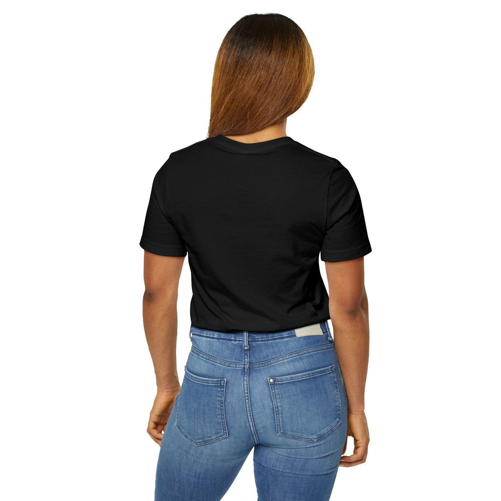 A person with long, straight brown hair is seen from behind wearing an Anti Social She-Wolf T-Shirt — Funny Introvert Graphic Tee and blue jeans.