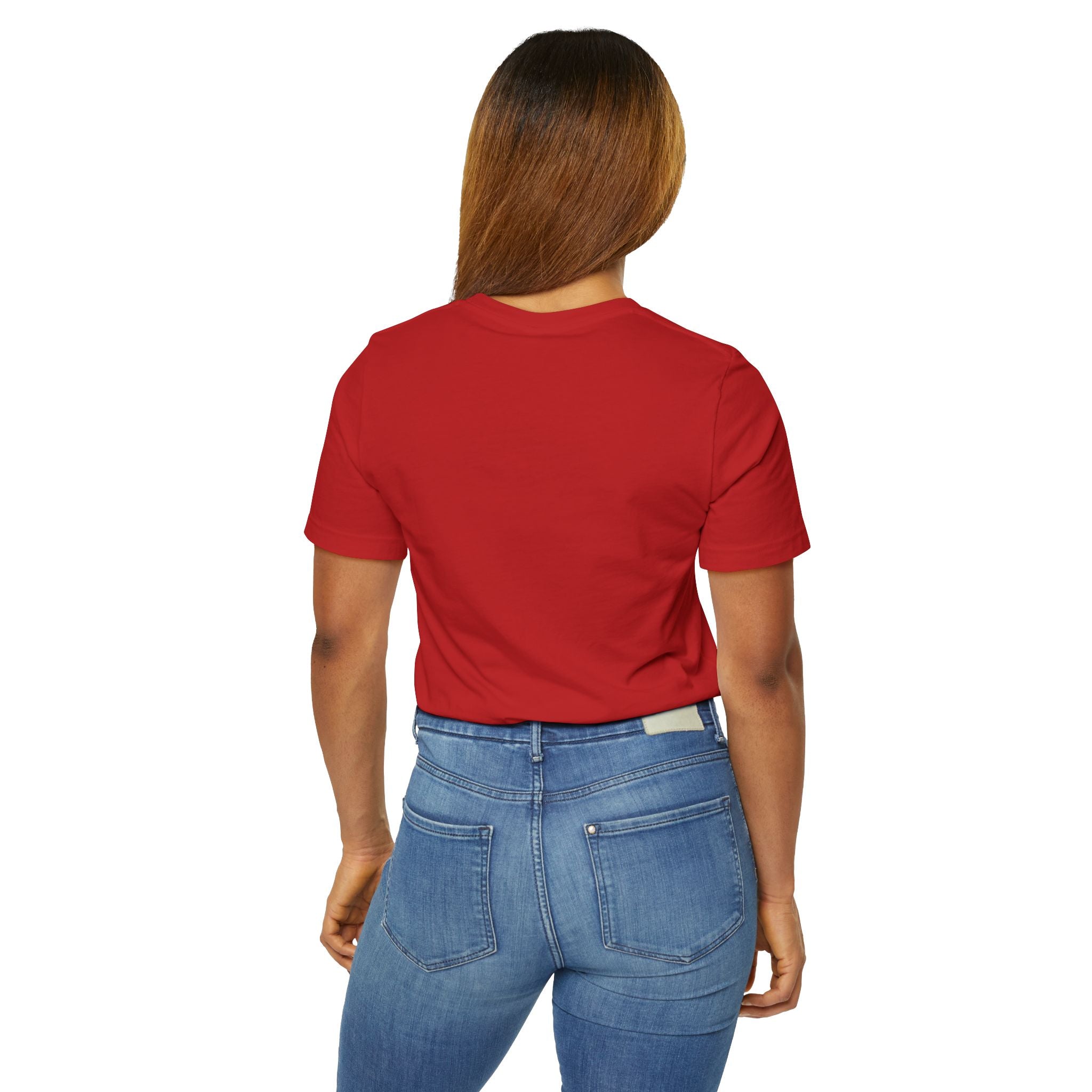 A woman with straight brown hair is seen from the back, wearing a plain red TimeWarp Drip Anti Social Wolf T-Shirt — Funny Introvert Graphic Tee with blue jeans against a white background.