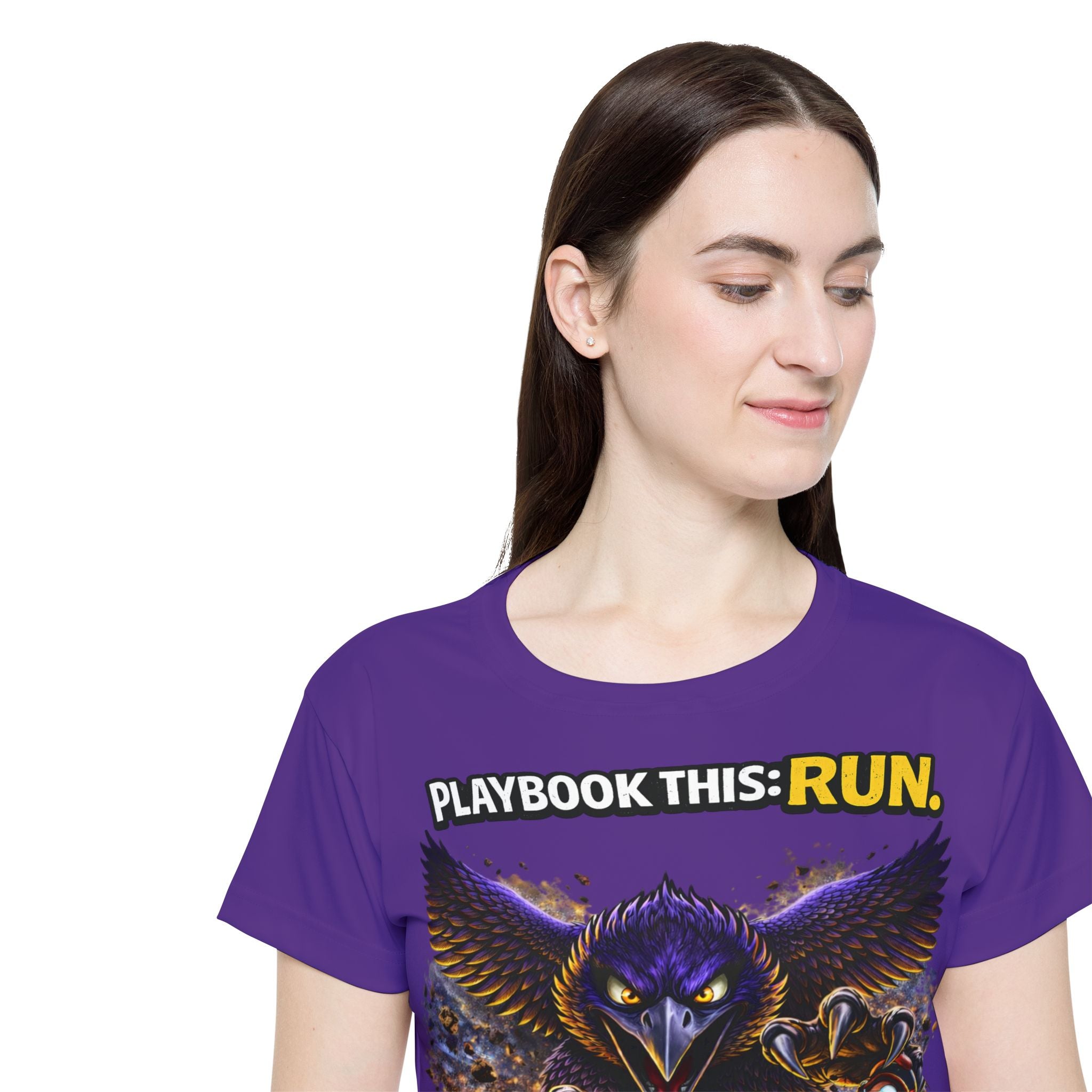 TimeWarp Drip Confident woman rocking a purple Turf Raiders jersey by TimeWarp Drip, fierce bird graphic, serving streetwear heat—eyes down, vibe up. streetwear apparel