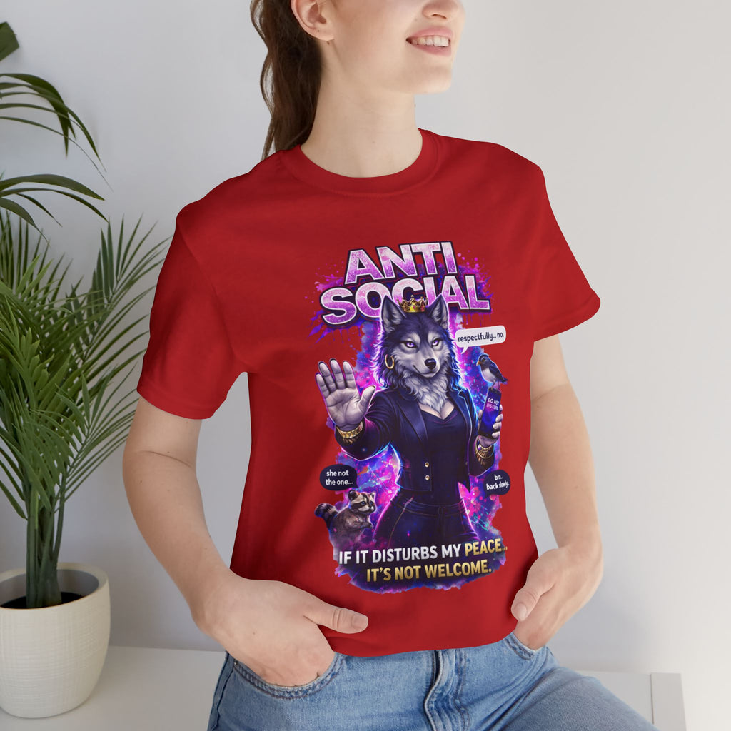 Someone sports the Anti Social She-Wolf T-Shirt—an introvert tee featuring a red shirt with an anthropomorphic cat in a suit, “ANTI SOCIAL” text, another small cat, and the phrase, “If it disturbs my peace, it’s not welcome.”.