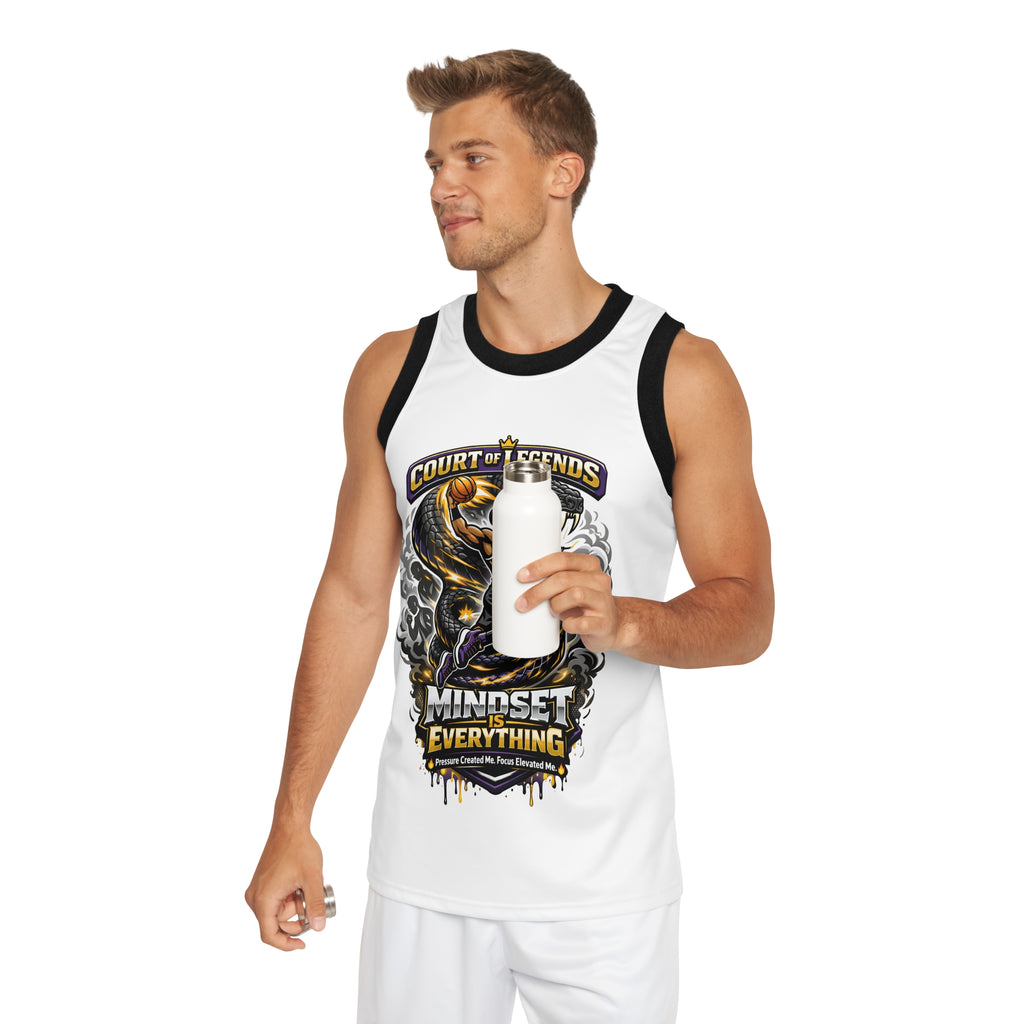 A man smiles against a white background, wearing the Court of Legends - (White) Basketball Jersey made from moisture-wicking polyester with the "Mindset is Everything" graphic, and holding a white water bottle.
