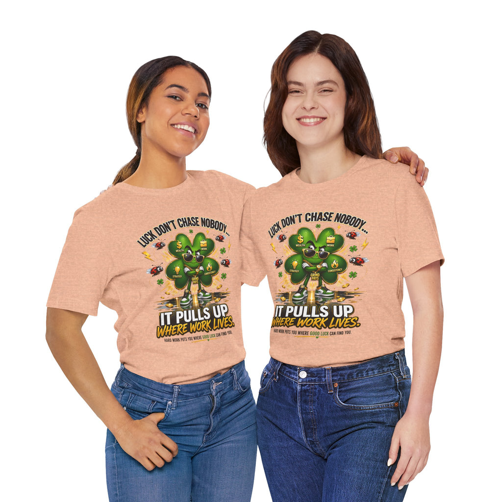 TimeWarp Drip Two women flex in bold black Printify streetwear tees, rocking “Luck Don’t Chase Nobody” 4-leaf clover graphic in style. streetwear apparel