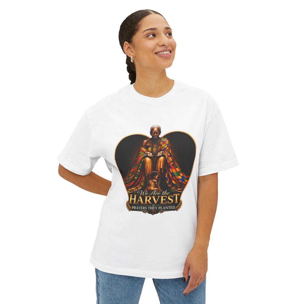 TimeWarp Drip – Oversized white Premium Urban Fashiontee with vibrant seated figure graphic and bold “Harvest” text, worn by woman for urban style impact. | premium streetwear