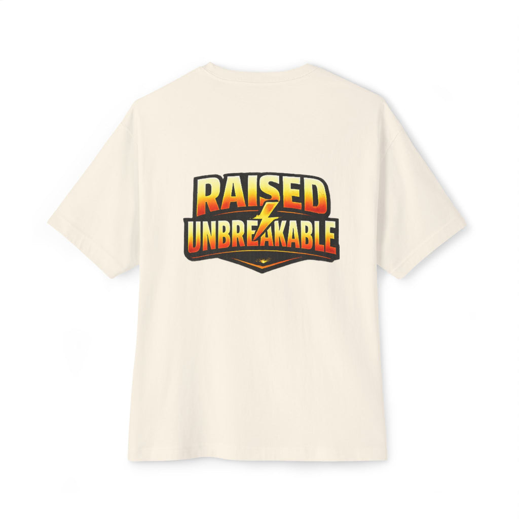 The Generation X Parenting "Come Get Em" Tee by TimeWarp Drip is a cream oversized boxy cotton tee with a bold back graphic reading RAISED UNBREAKABLE in yellow-orange gradient, separated by a lightning bolt.