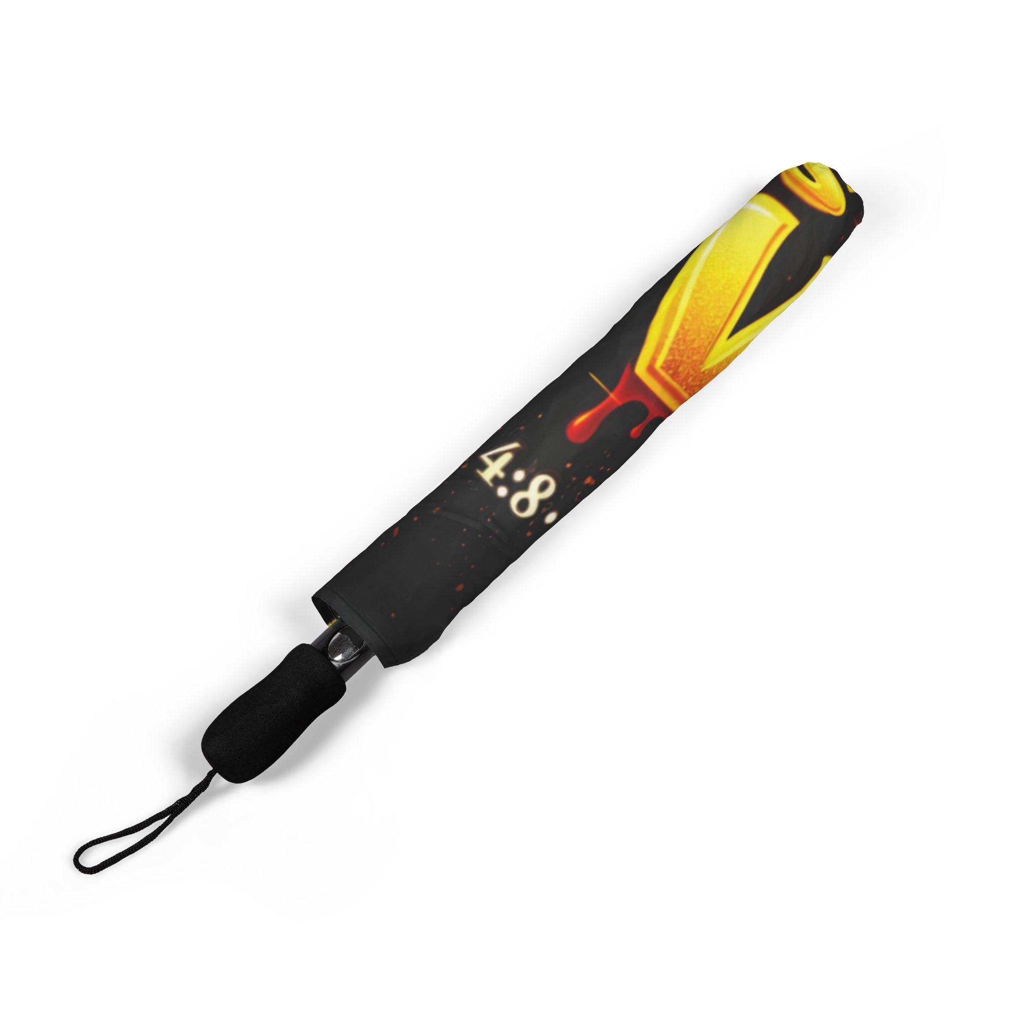 The "God Is Love" Design (Semi‑Automatic) Foldable Black Umbrella features a yellow and red graphic, a partially visible 4.8 on the cover, a black wrist strap, and a one-size canopy diameter.