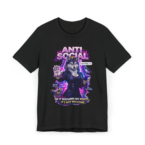 The Anti Social She-Wolf T-Shirt is a black graphic tee for introverts, featuring a snarky wolf in a suit with purple and blue accents. The text reads ANTI SOCIAL and IF IT DISTURBS MY PEACE... ITS NOT WELCOME with glowing speech bubbles.