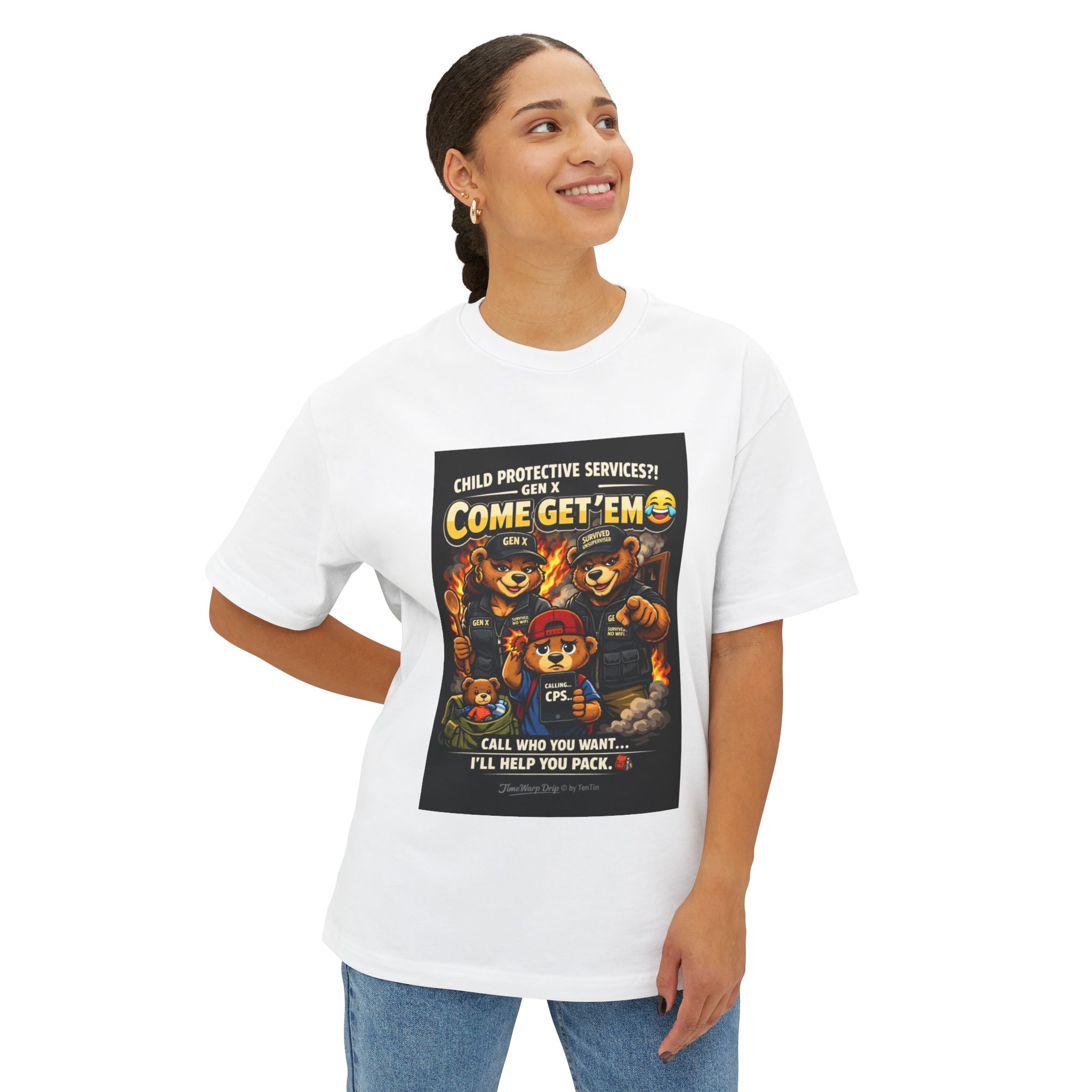 A smiling woman with tied-back hair models the Generation X Parenting "Come Get Em" Tee by TimeWarp Drip, an oversized boxy cotton t-shirt featuring colorful cartoon bears and bold text, against a plain white background.