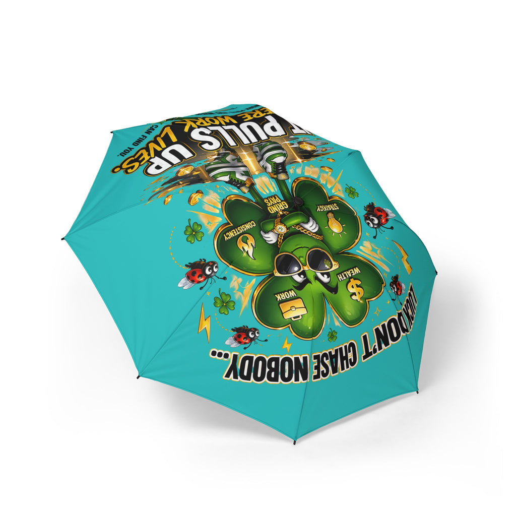 The Printify Lucky Clover "Pulls Up Lives" Foldable Umbrella in teal features a cartoon clover with sunglasses, red and black insects, dollar signs, and phrases like Short Pulls Up and Dont Chase Nobody across the canopy. One size fits all.