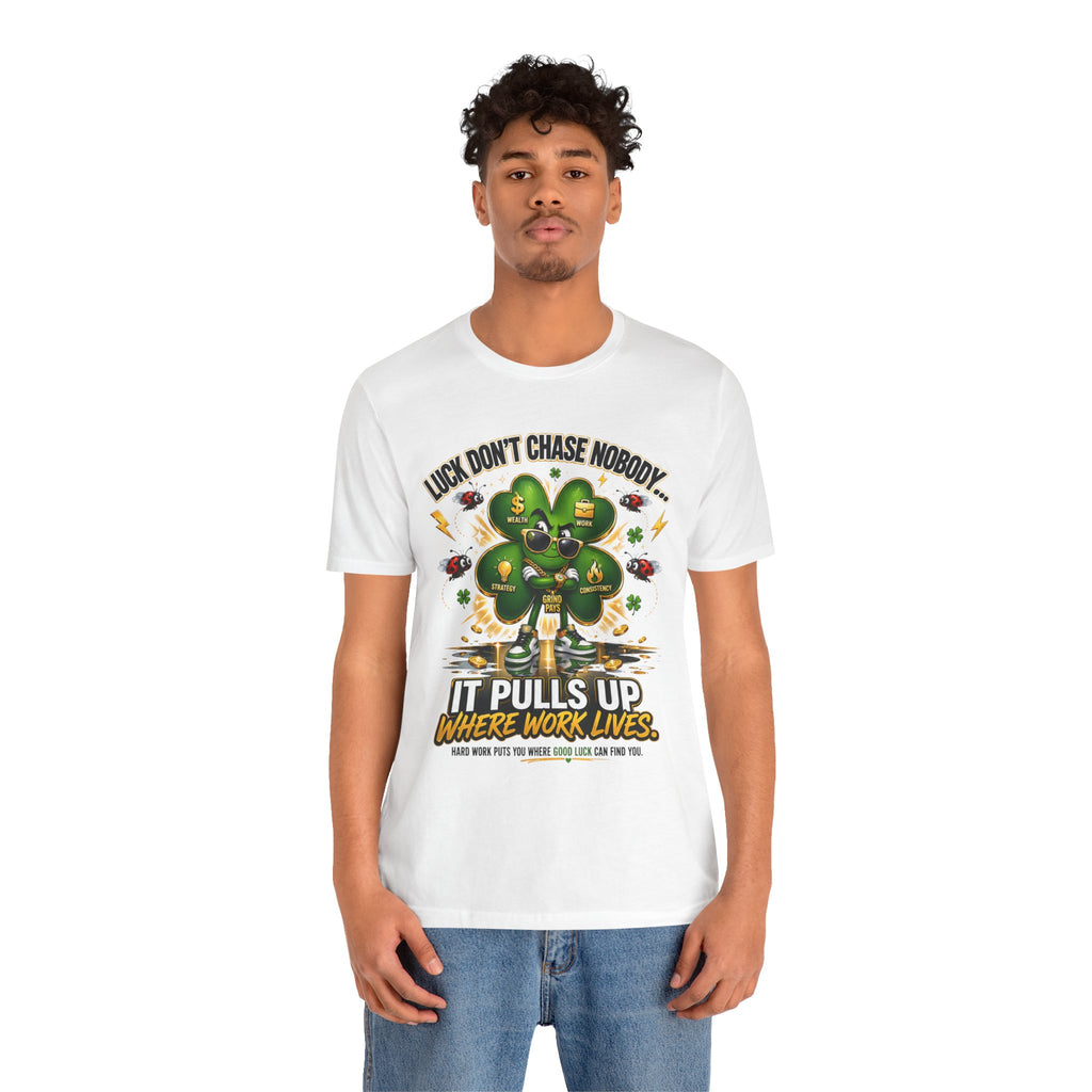 TimeWarp Drip Confident dude rocks a black Printify Luck Don’t Chase Nobody tee, bold clover graphic, streetwise work-hustle mantra. streetwear apparel