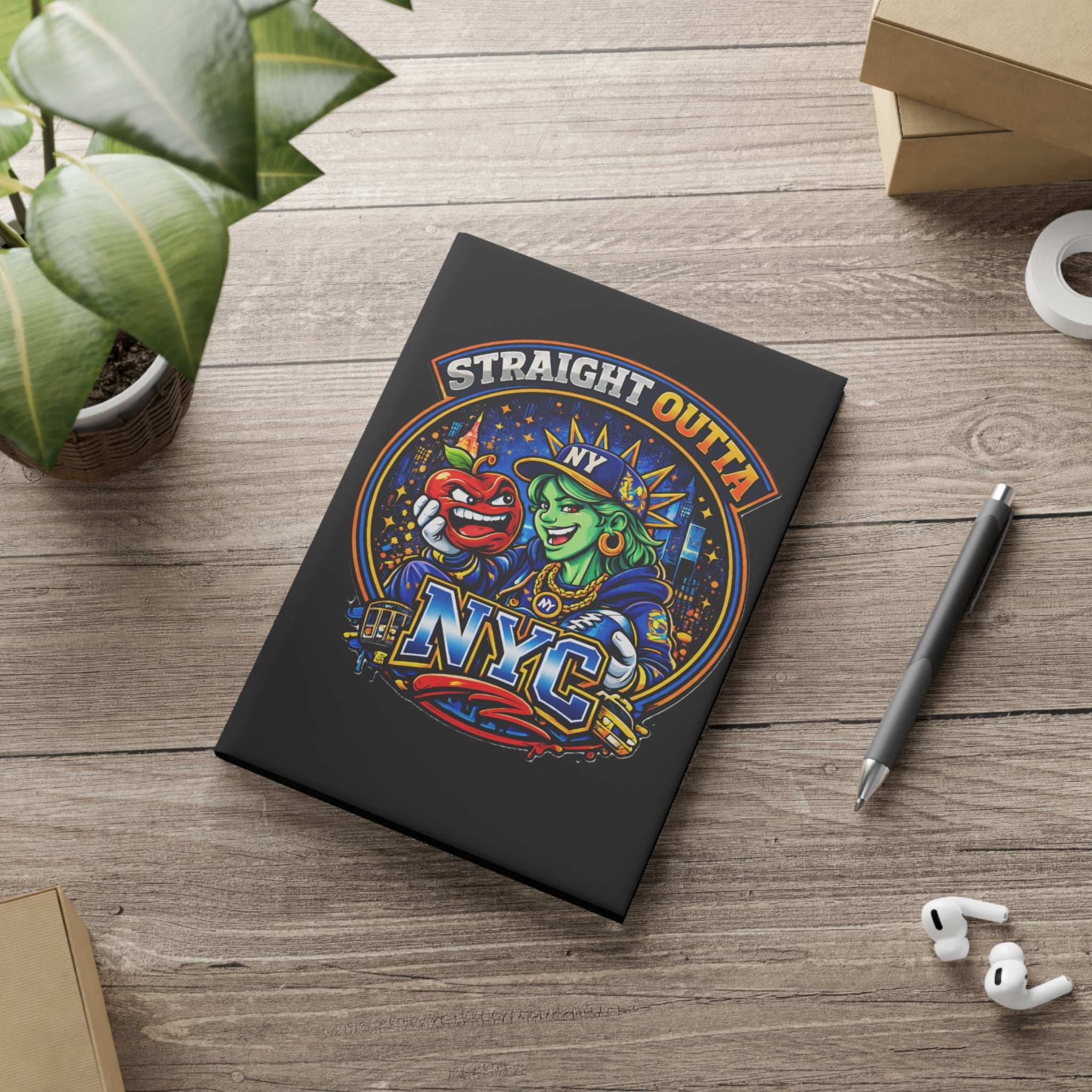 Black hardcover notebook featuring a New York City Statue of Liberty graphic, ideal for journaling or note-taking.