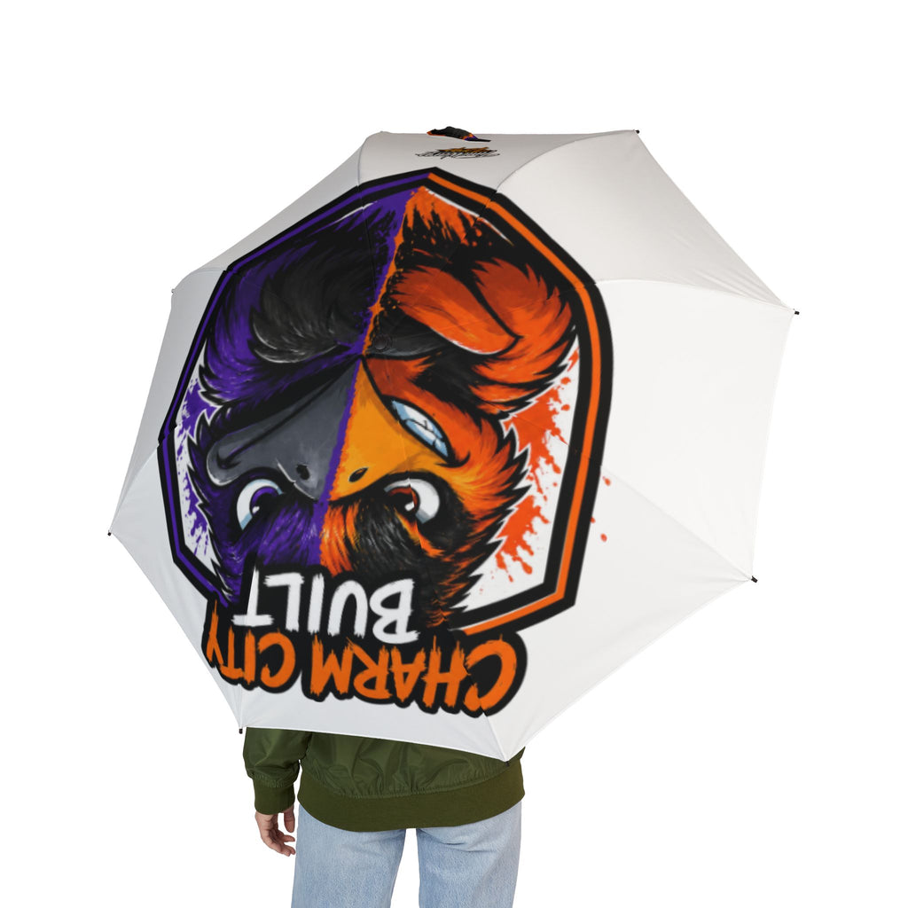 TimeWarp Drip Rocking a white foldable umbrella, “Charm City Built” drips bold with a split-face bird—Baltimore streetwear vibes!.