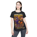 A woman with long brown hair wears the Printify "Straight Outta Baltimore" Women’s Sports Jersey, a black Charm City fan tee featuring two cartoon birds and bold, colorful text.
