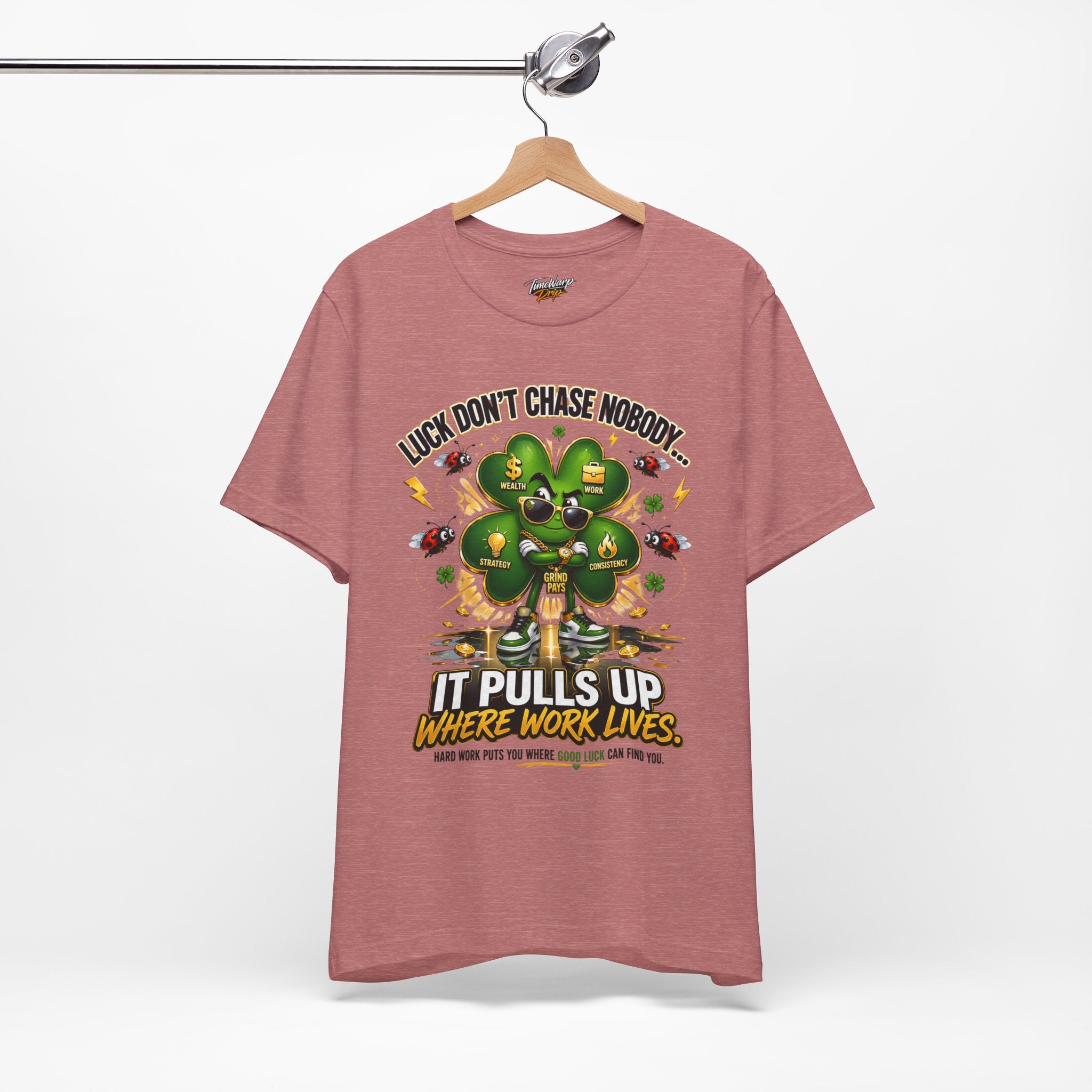 TimeWarp Drip Printify black "Luck Don't Chase Nobody" tee—bold clover and money bags, dripping street style on hanger, white backdrop. streetwear apparel