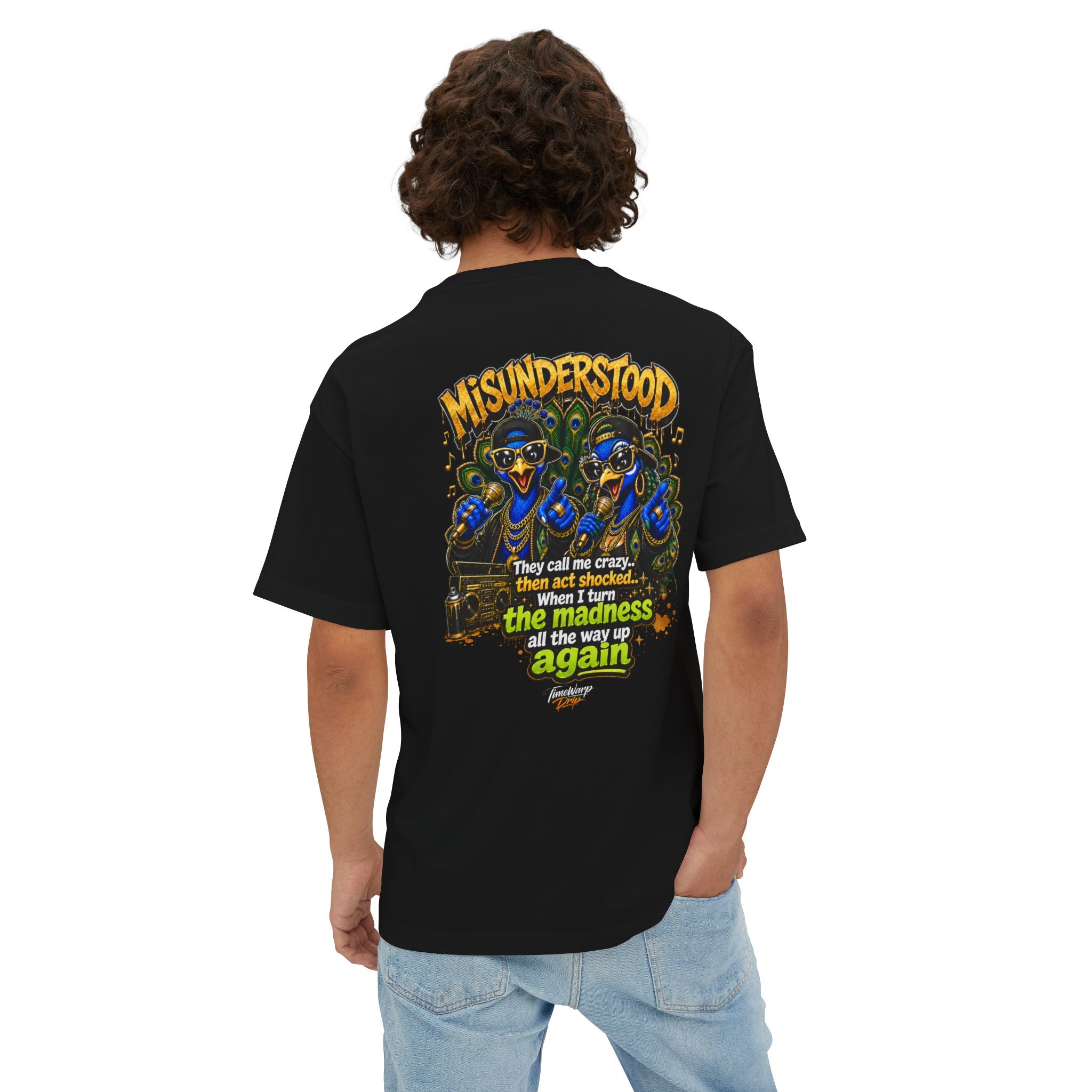 TimeWarp Drip – Oversized black boxy tee, bold “They Call Me Crazy I Call It Genius” text, dual peacock street art graphics. | premium streetwear