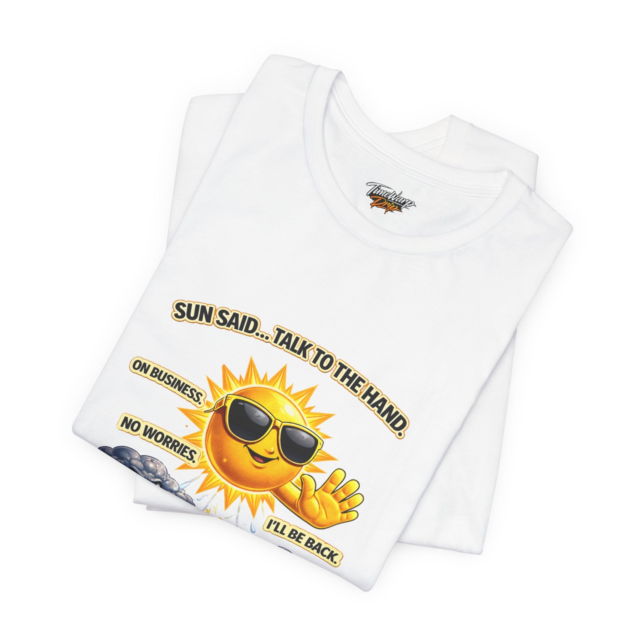 The Calm Energy Vibes T-Shirt — "I Run the Forecast" CEO Energy is a folded white Airlume cotton tee featuring a cartoon sun with sunglasses and “SUN SAID... TALK TO THE HAND! ON BUSINESS. NO WORRIES. ILL BE BACK.” on the front.