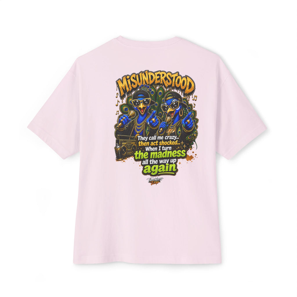 TimeWarp Drip – Light pink oversized tee with bold dual peacock street art and "They Call Me Crazy I Call It Genius" statement graphic. | premium streetwear