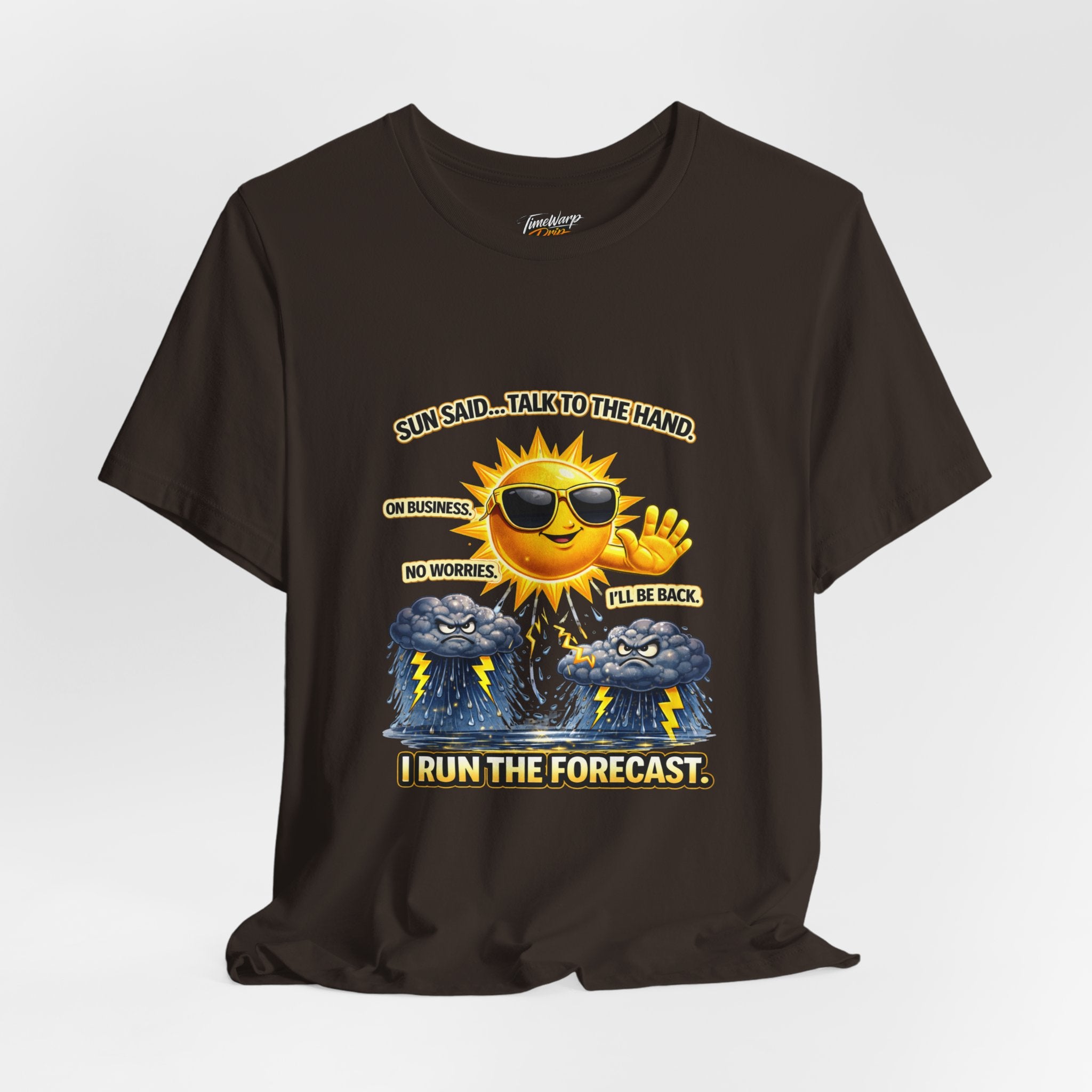 The TimeWarp Drip Calm Energy Vibes T-Shirt — "I Run the Forecast" CEO Energy features a cartoon sun with sunglasses waving above clouds, with text: Sun said… talk to the hand. On business. I’ll be back. Lightweight Airlume cotton tee.