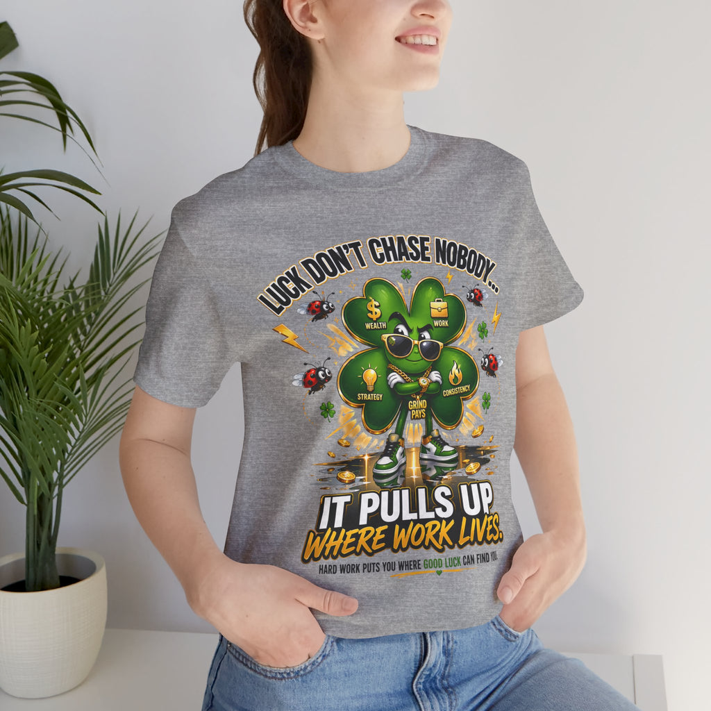 TimeWarp Drip Confident woman flexes green "Luck Don't Chase Nobody" 4-Leaf Clover tee—Printify streetwear vibes, bold and unstoppable. streetwear apparel