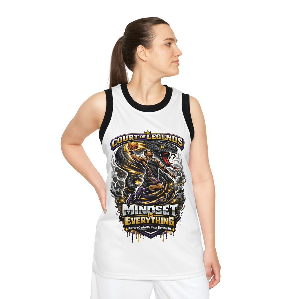 A woman wearing the Court of Legends - (White) Basketball Jersey, made from moisture-wicking polyester, looks to the side. The unisex jersey features an illustrated player, hoop, and the text "Court of Legends. Mindset is Everything.