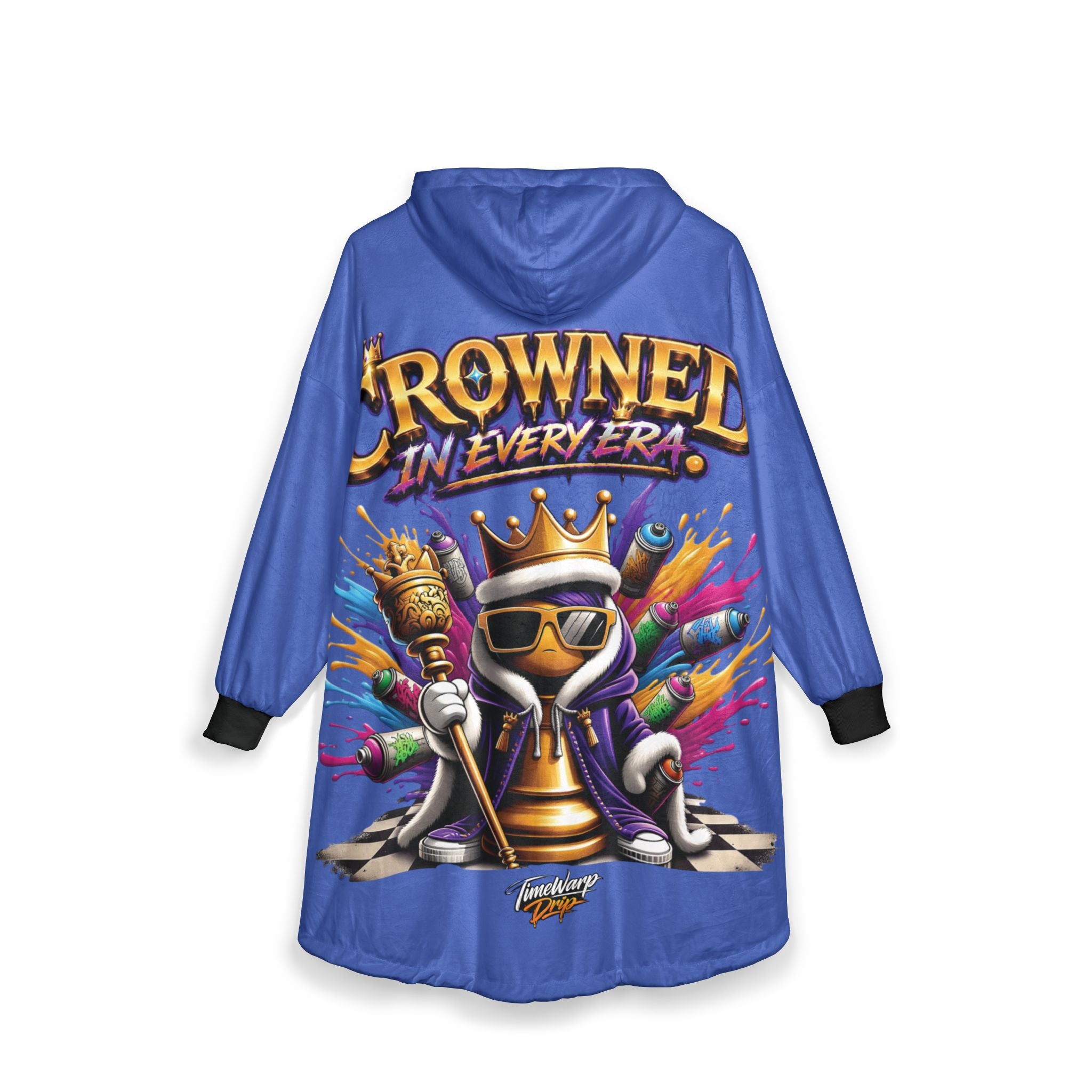 The "Crowned in Every Era" Royal Chess Graphic—Royal Blue Hooded Blanket features a cartoon chess piece with a crown, sunglasses, and scepter, surrounded by colorful spray paint cans and bold text. One size fits all.