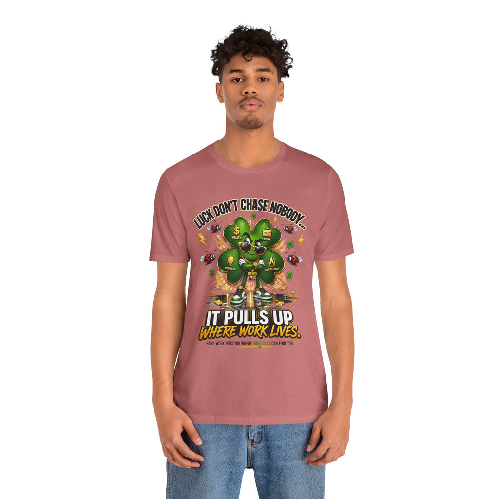 TimeWarp Drip Confident guy rocking a bold black Printify streetwear tee—“Luck Don’t Chase Nobody” & 4-leaf clover, crisp white backdrop. streetwear apparel